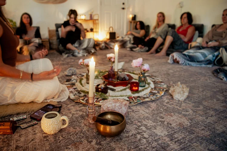 Women gathered in community during a Highest Source Healing ceremony
