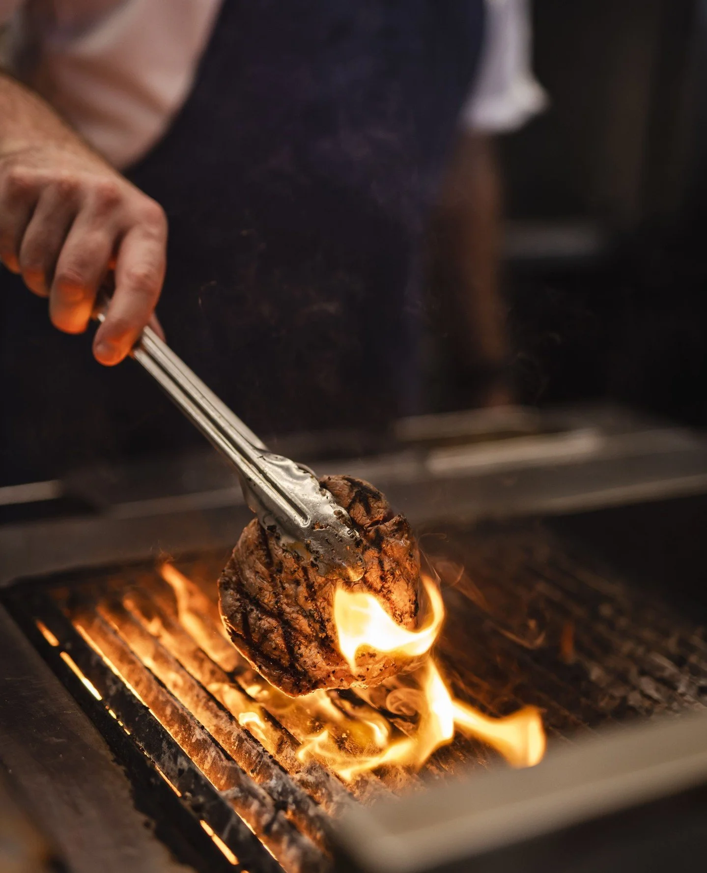 Flames on, flavour locked in 🔥🥩 Our in-house chef grilling to perfection, where fire meets finesse.
