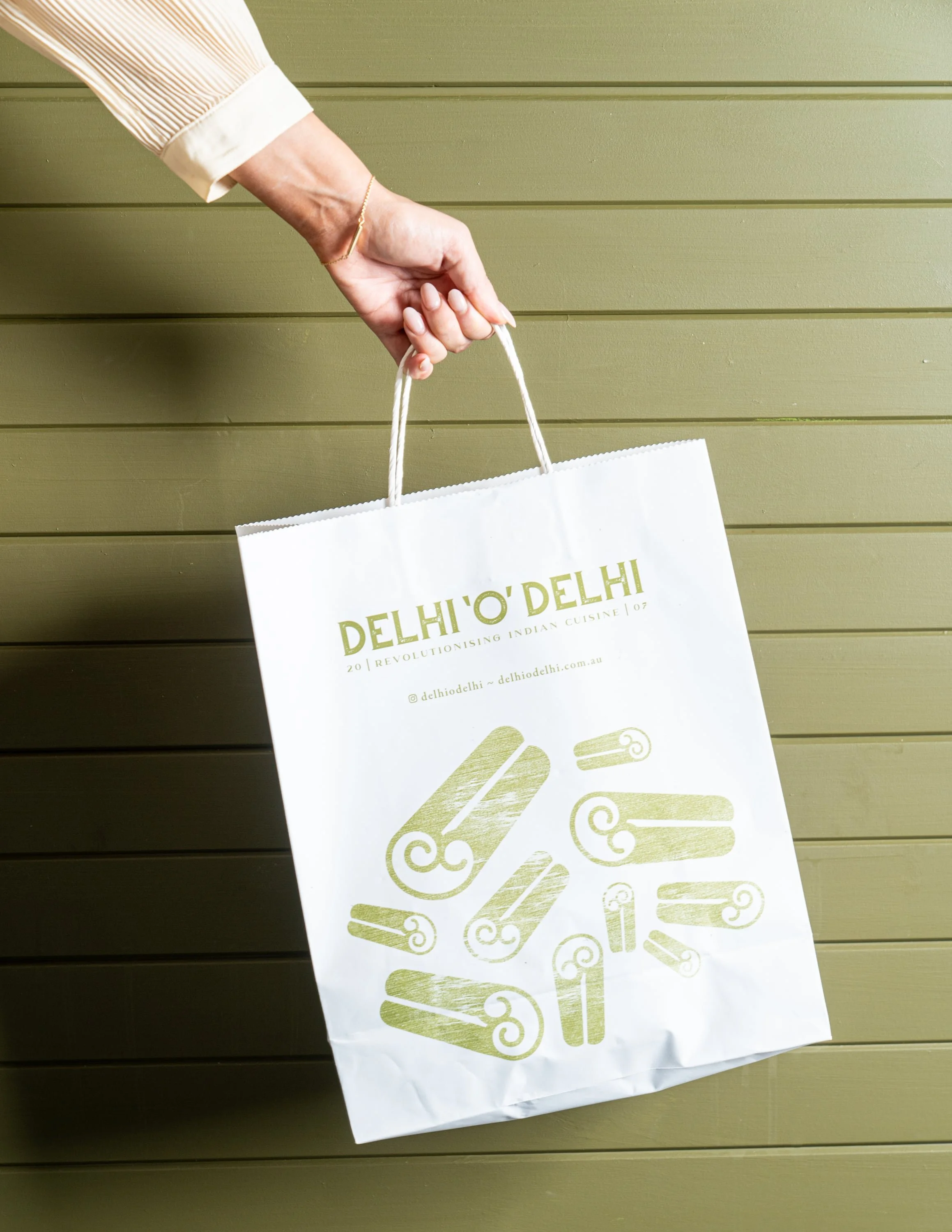 Delhi ‘O’ Delhi Indian takeaway bag ready for delivery in Newtown