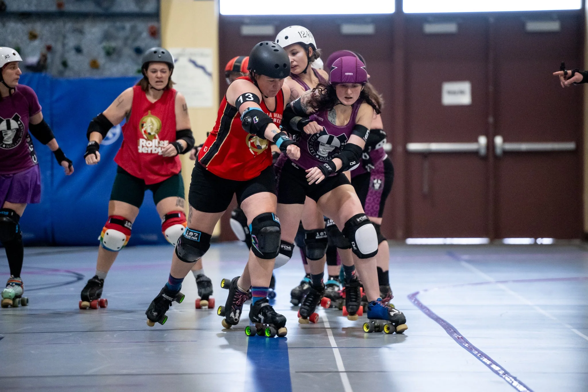 skaters play roller derby