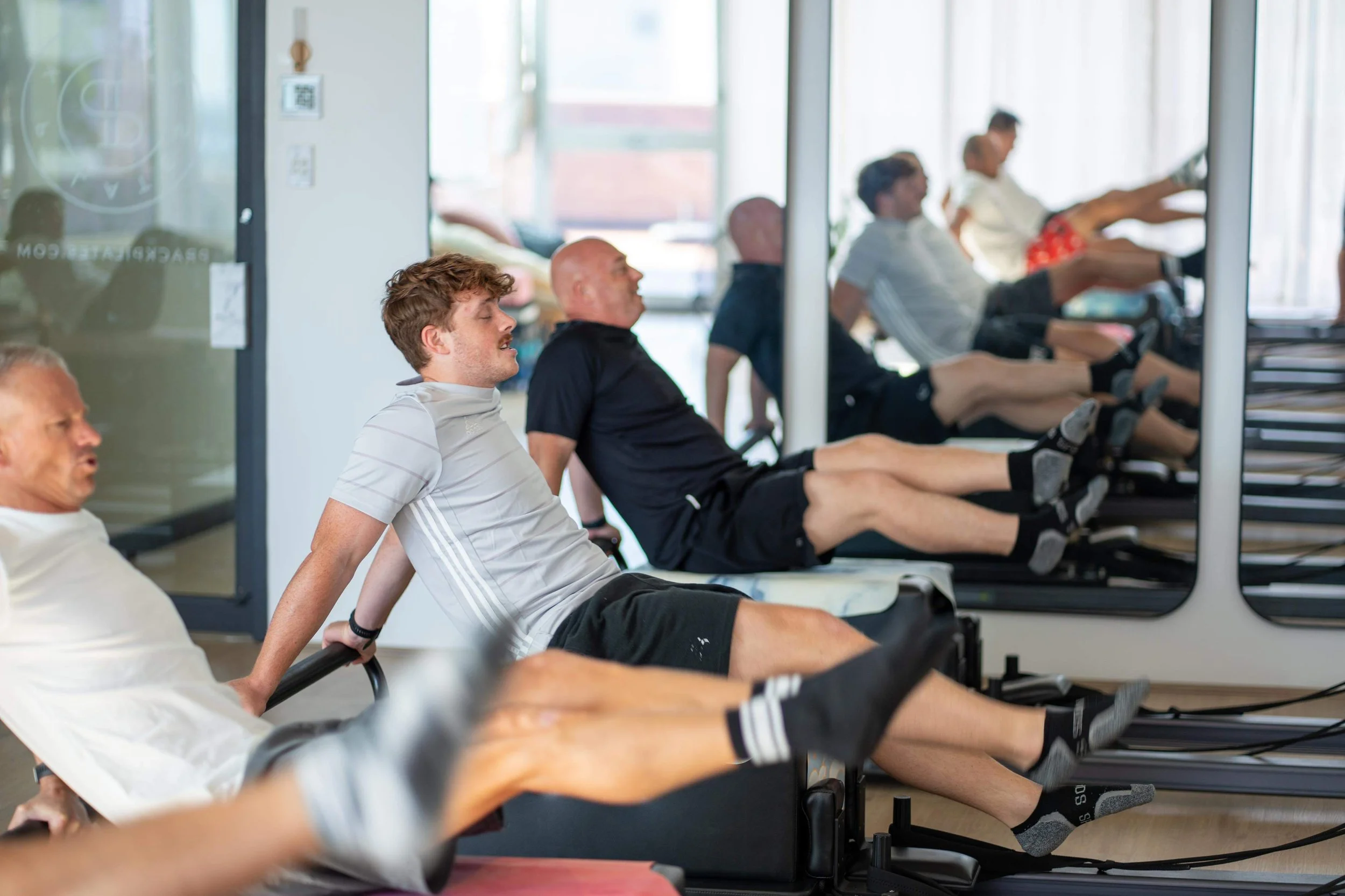 Mens group reformer pilates - Prack Pilates Kiama