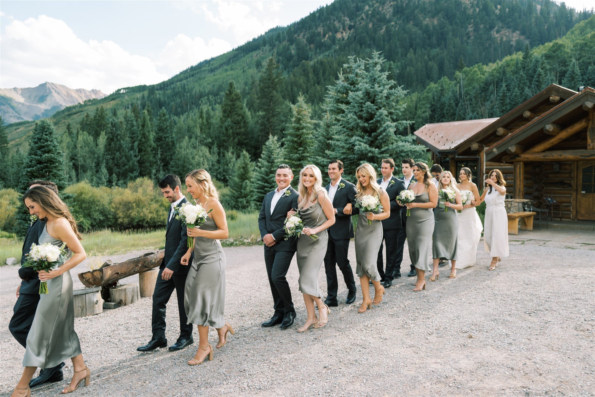 bridal-party-walking-in-mountains.jpg
