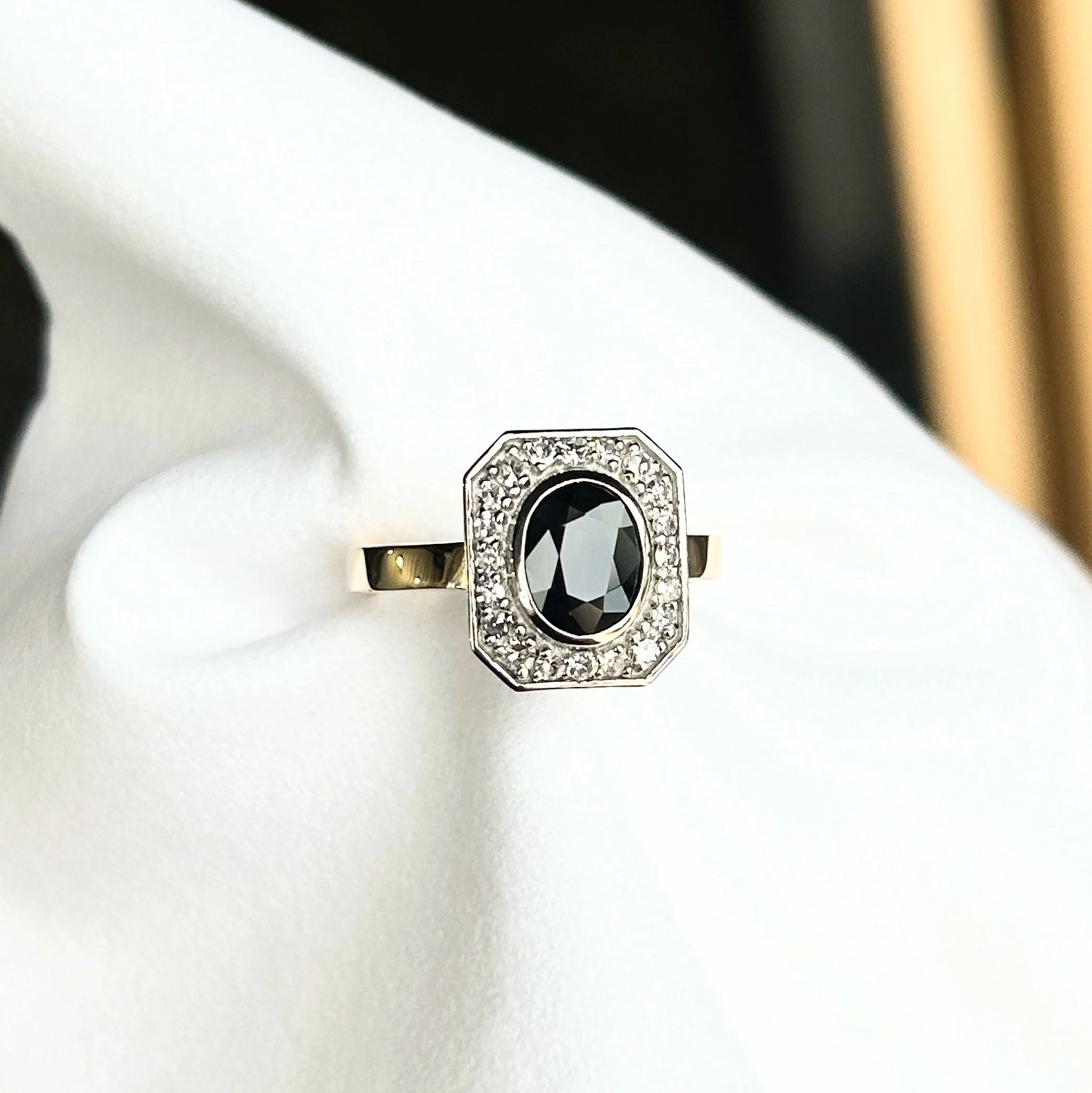 After remodelling sapphire and diamond ring