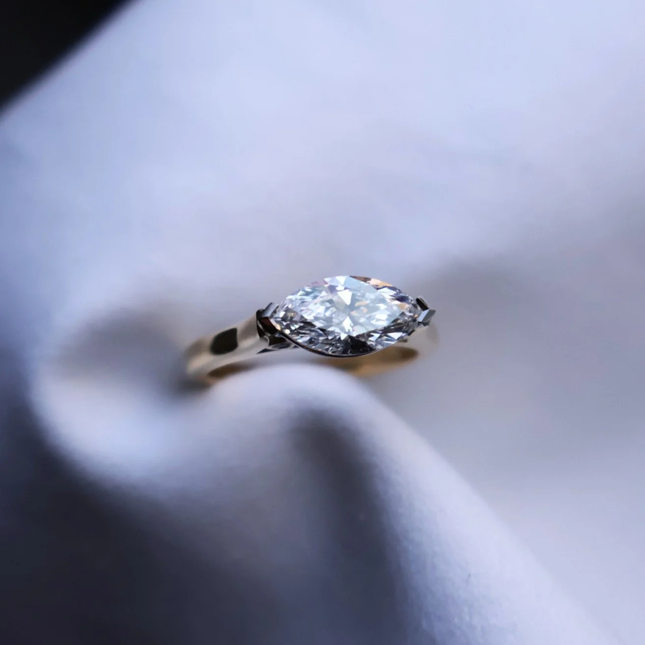 Personalised east west marquise engagement ring