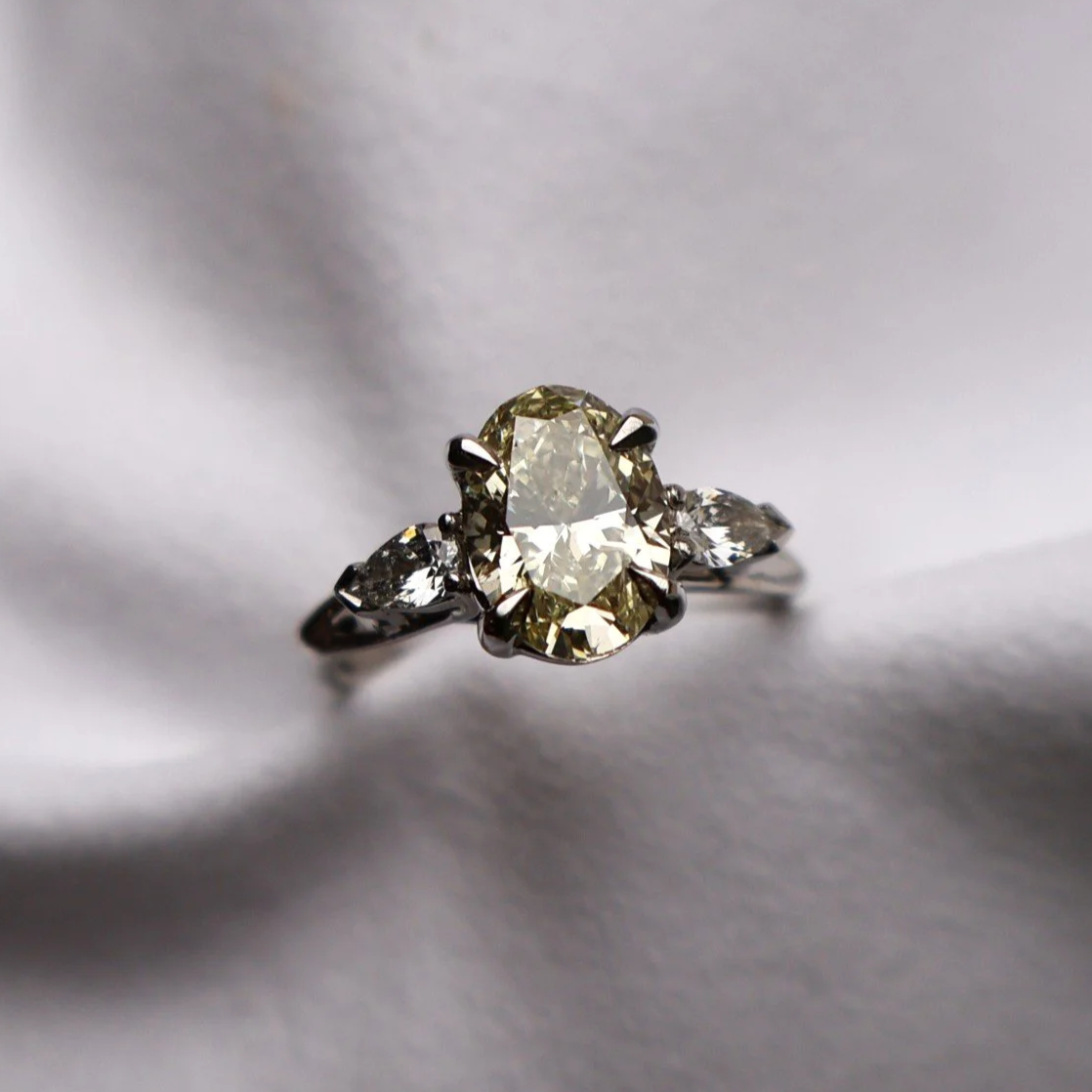 2ct Oval yellow diamond and pear-shaped white diamond trilogy ring handmade in platinum