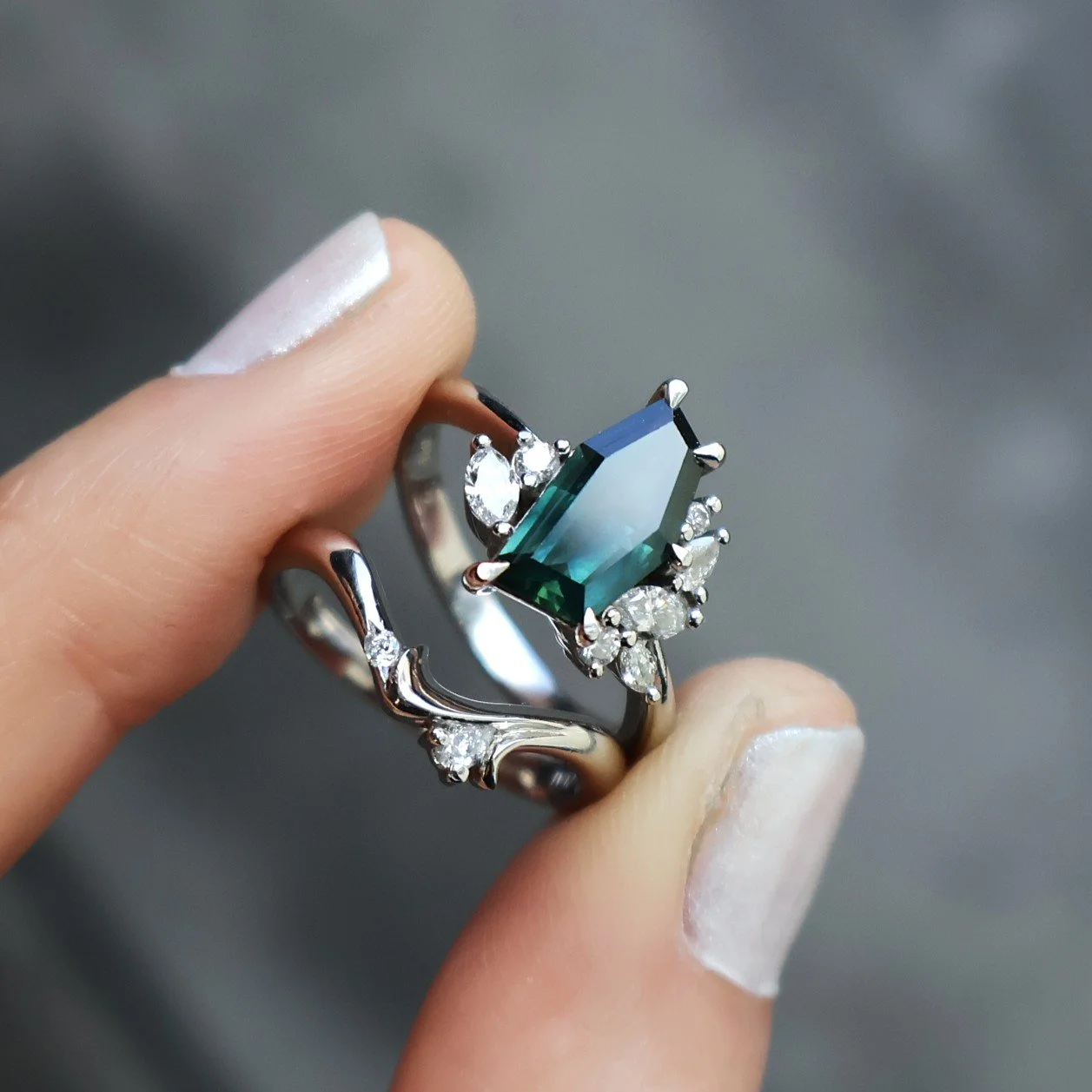 Freeform teal and diamond cluster ring with wedding band.JPG