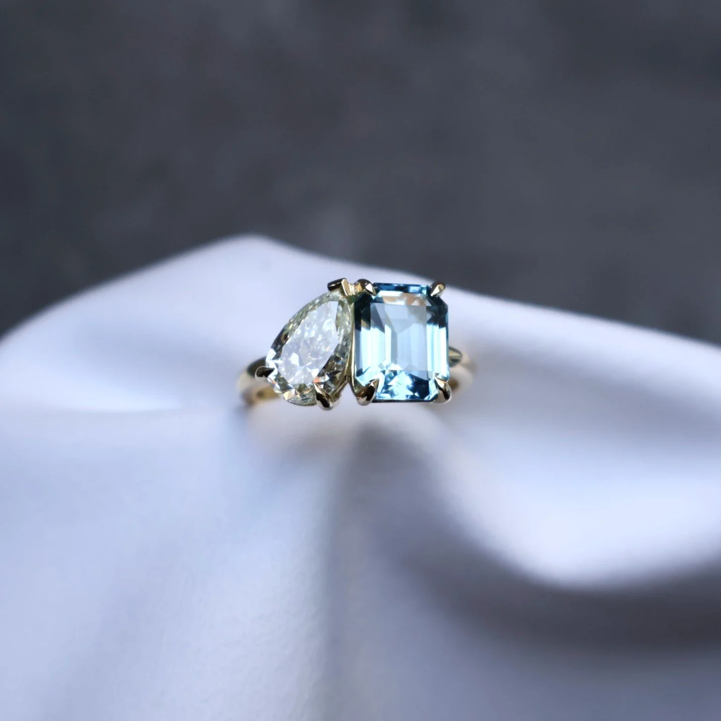 Emerald cut aquamarine and diamond two stone ring