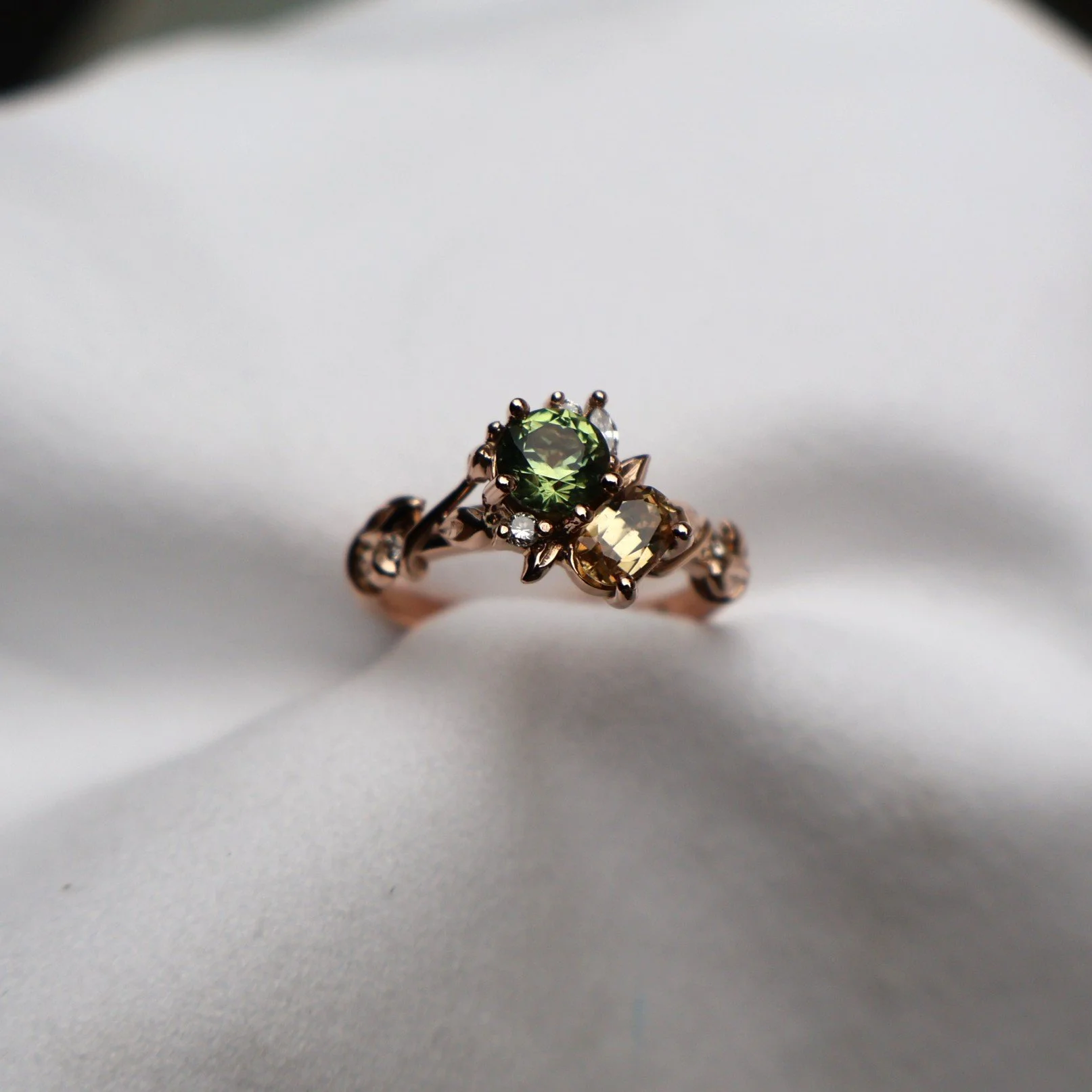 Nature inspired engagement ring made with sapphires and diamonds