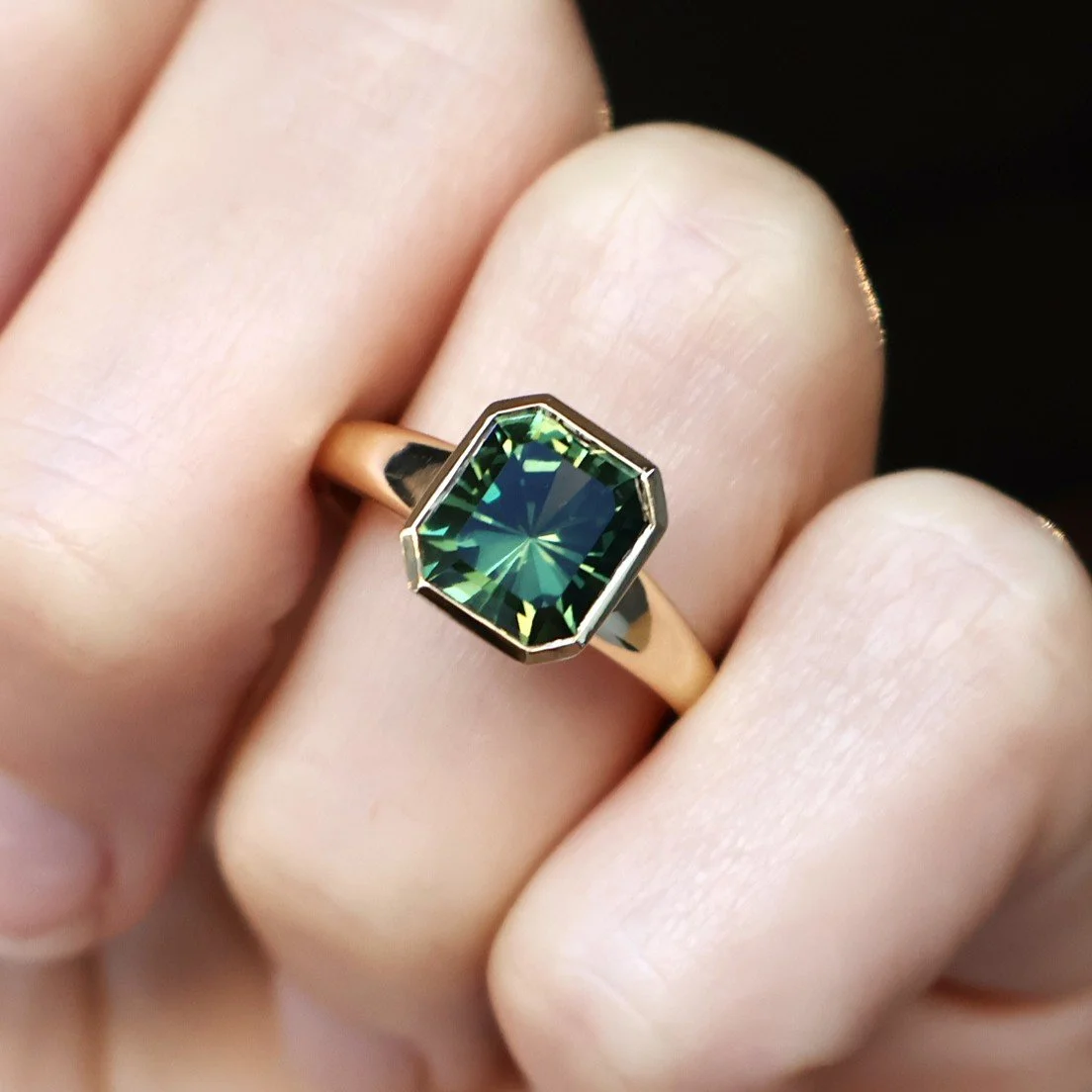 Green Sqaure radiant sapphire solitaire ring bezel set - Tahlia oh hand.JPG