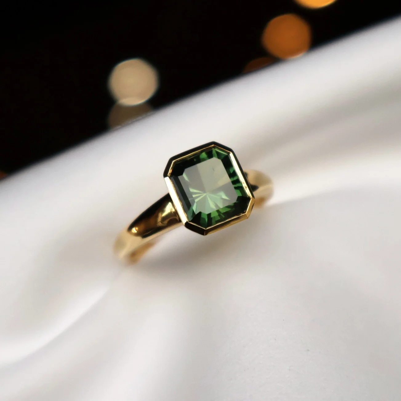 Green Sqaure radiant sapphire solitaire ring bezel set - Tahlia close up.JPG