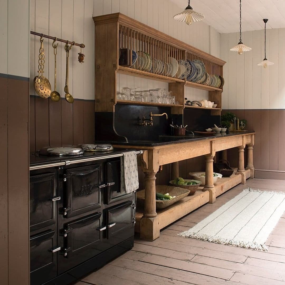 Traditional kitchen showcasing wooden cabinets and vintage stove