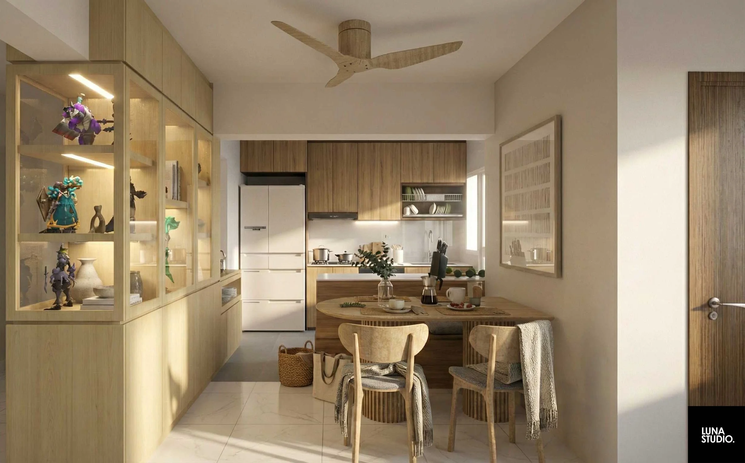Modern kitchen and dining area with wooden cabinetry, a glass display cabinet filled with decorative items, a round wooden dining table with four chairs, a ceiling fan, and natural light coming from a window.