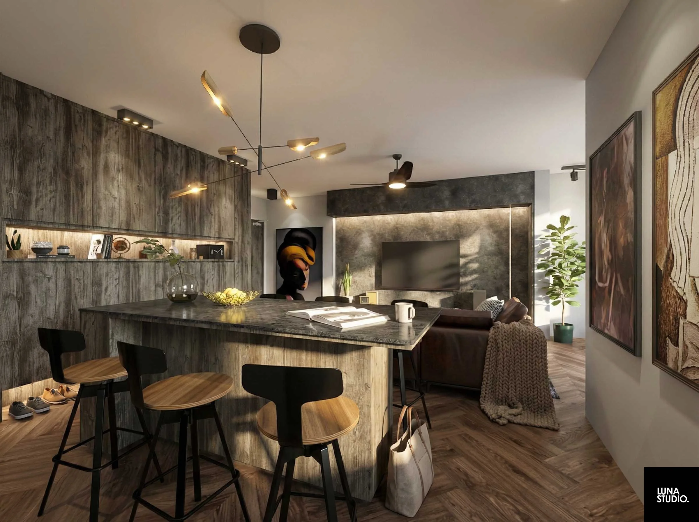 Modern living room with wooden floors and gray textured walls, featuring a kitchen island with four black and wood barstools, a TV on the wall, a brown sofa with a knit throw blanket, potted plant, artwork on the walls, and contemporary lighting fixtures.