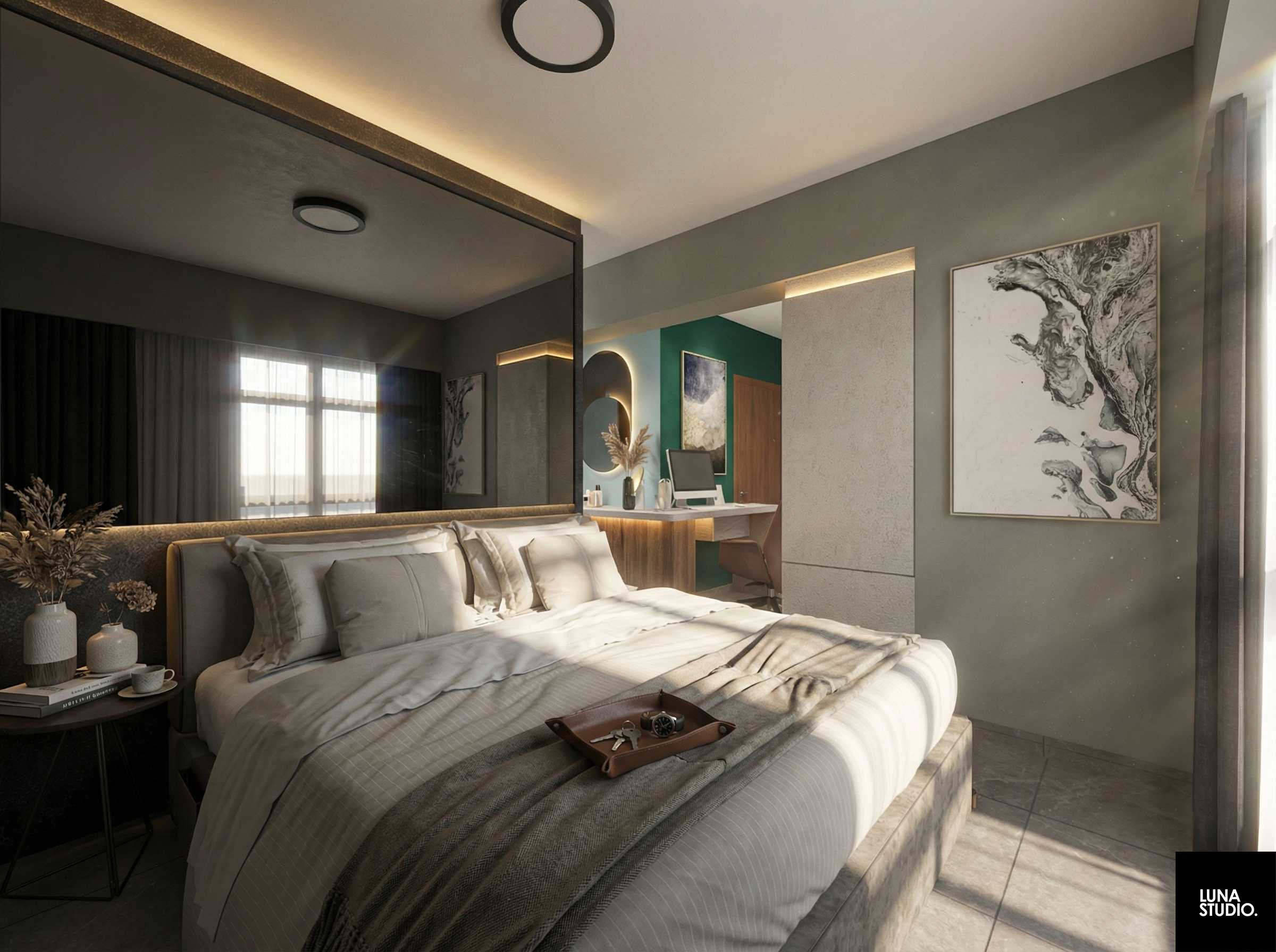 Modern bedroom with large bed, neutral-colored bedding, wooden tray with keys and watch, bedside table with vases and books, wall art, mirror, window with curtains, and a small workspace with a computer and decorative elements.