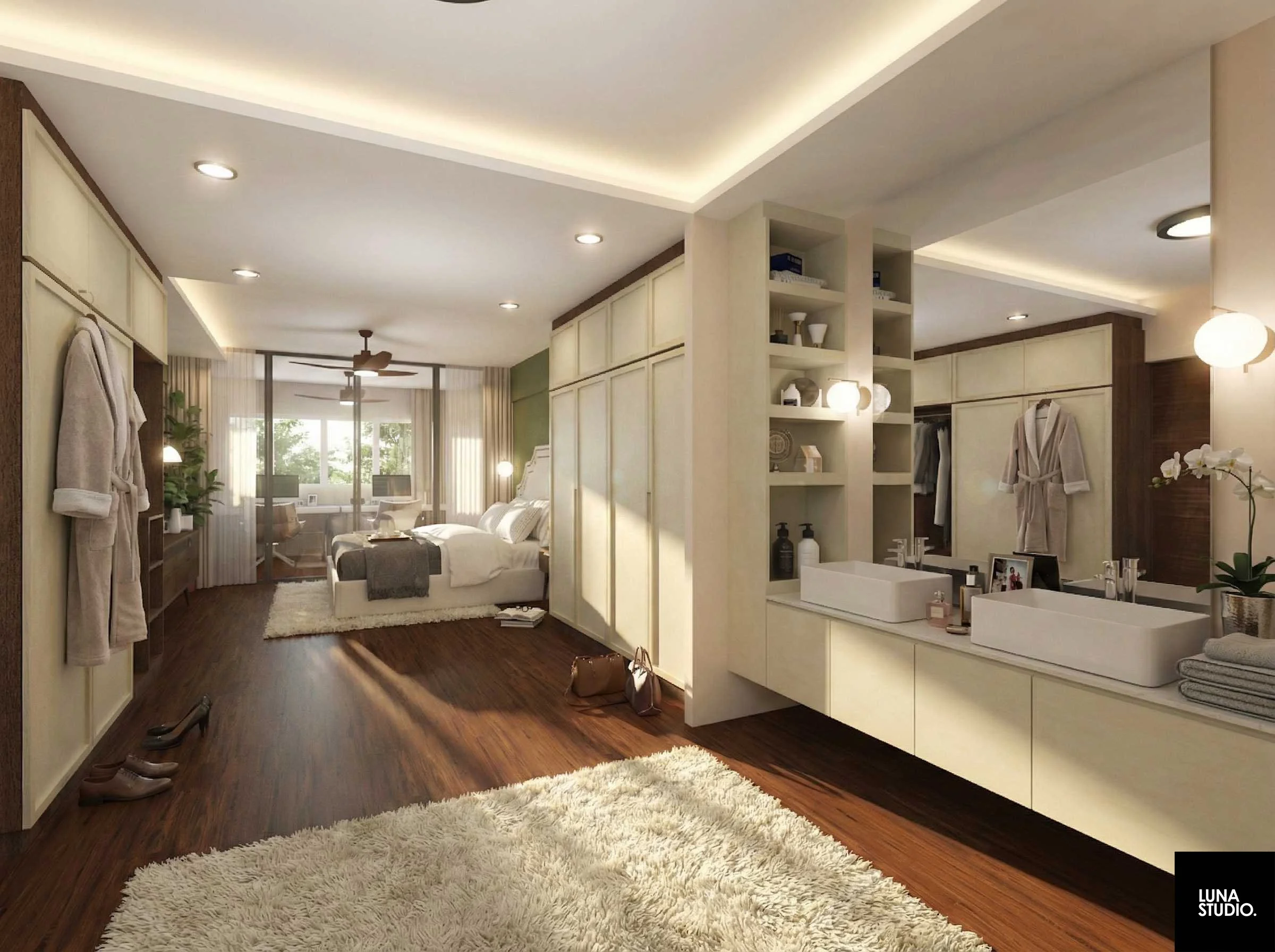 A modern, well-lit bedroom with wooden flooring, a large bed, a sitting area at the window, and a double sink vanity with toiletries and towels.