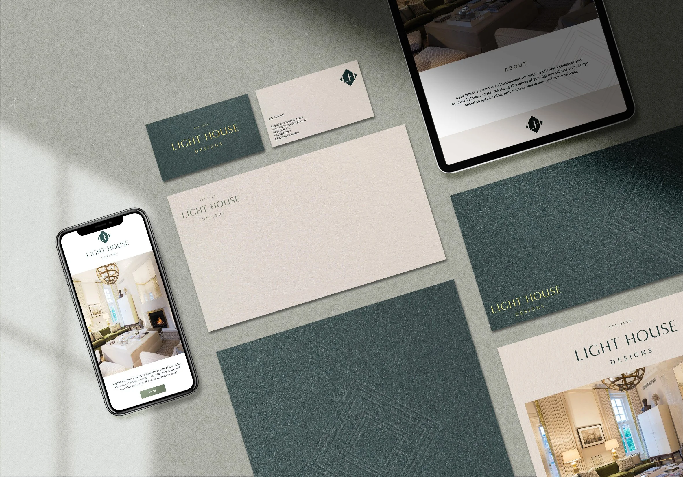 Brand identity designs for Light House Designs, featuring logo, stationery mock-ups, and monogram symbolising light and contrast.