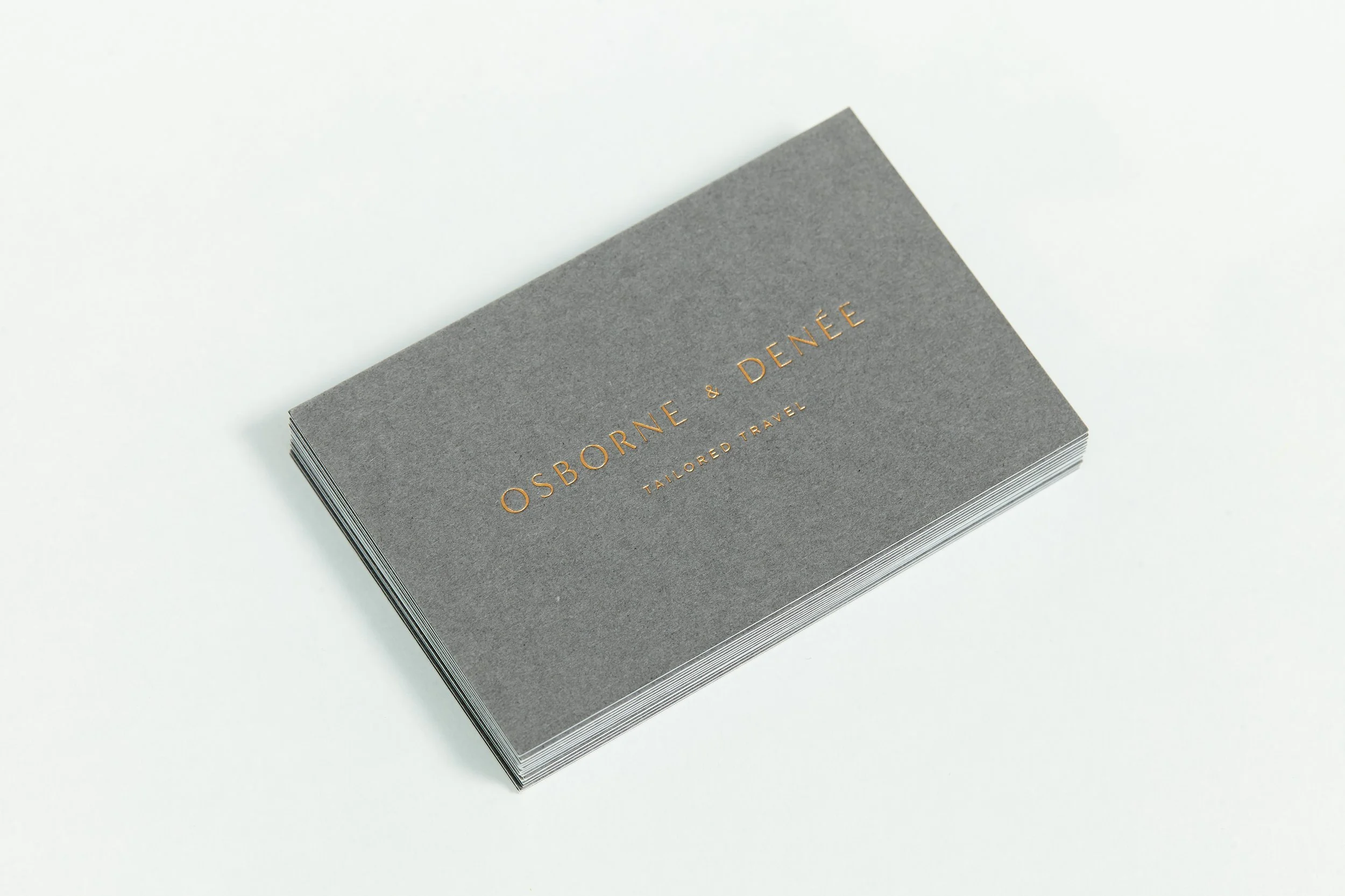 Brand identity designs for Osborne & Denée, including logo, monogram and colour palette for luxury travel branding.