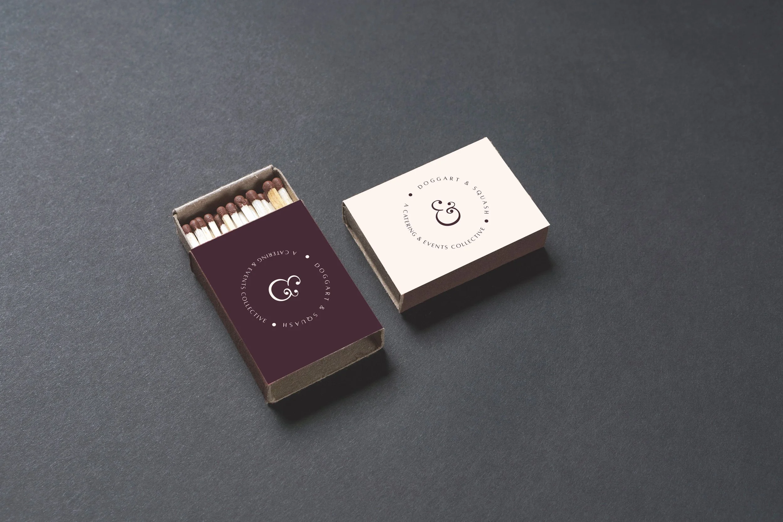 Brand identity designs for Doggart & Squash, showcasing logo, symbol, and branding in rich aubergine tones.