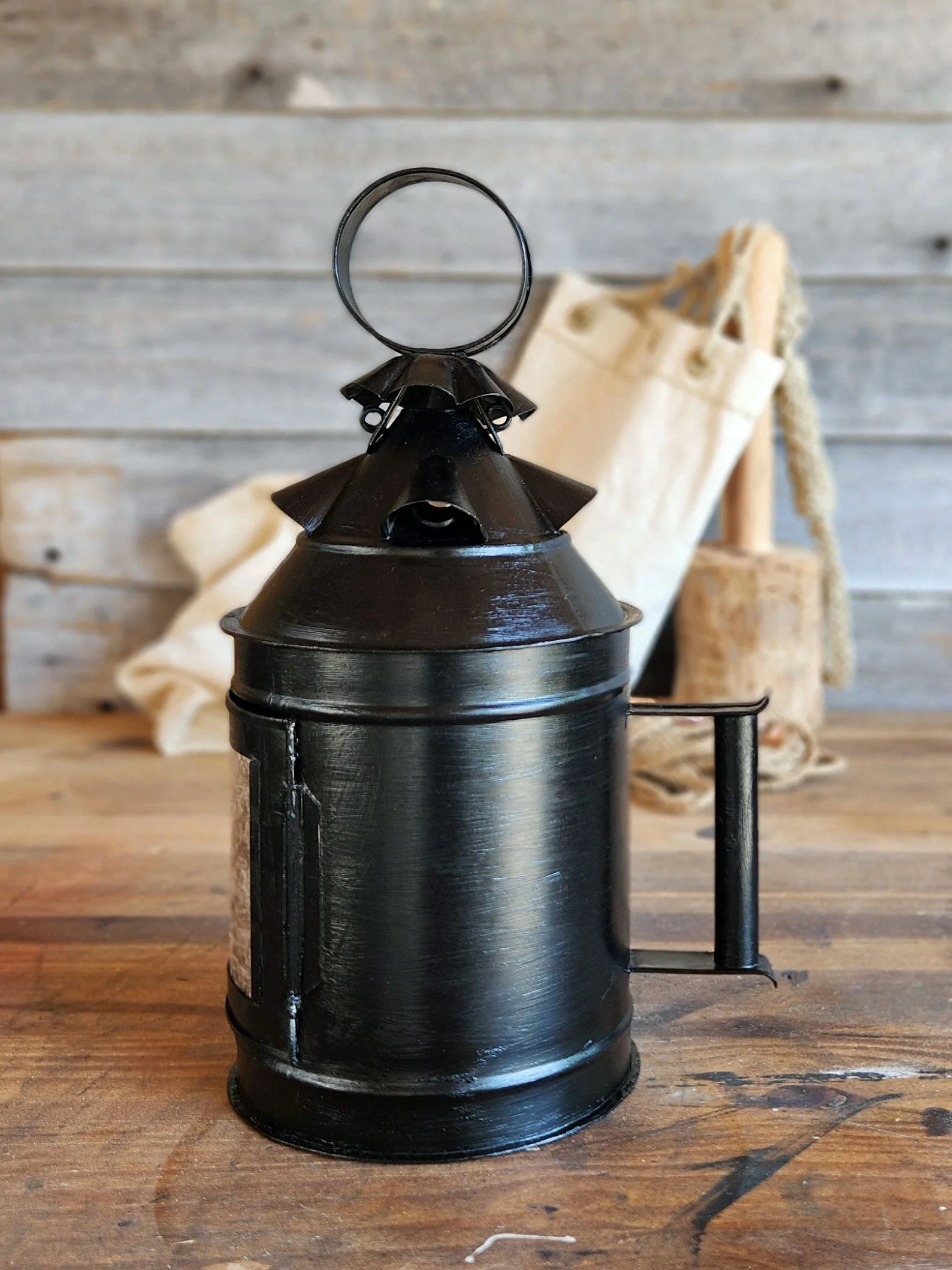 Round handmade 17th-century style tin lantern.