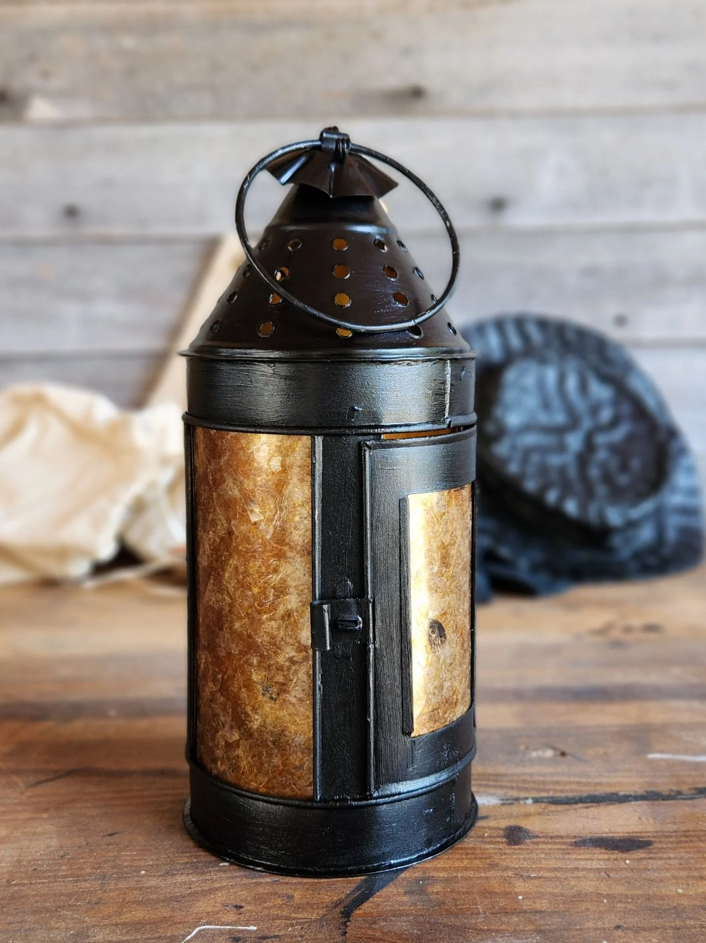 An traditional painted tin lantern made by Rob Gorrell - maker