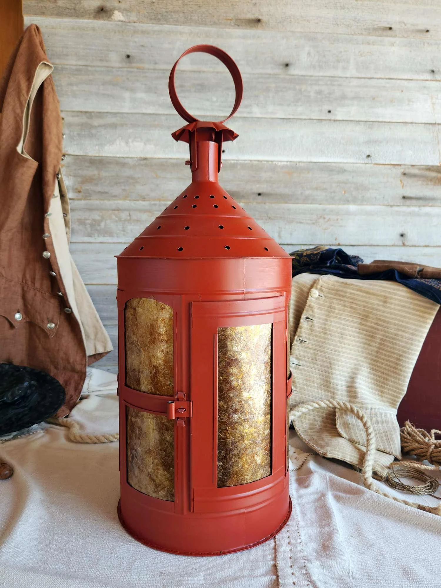Large 17th century styled lantern with red paint and amber panes.