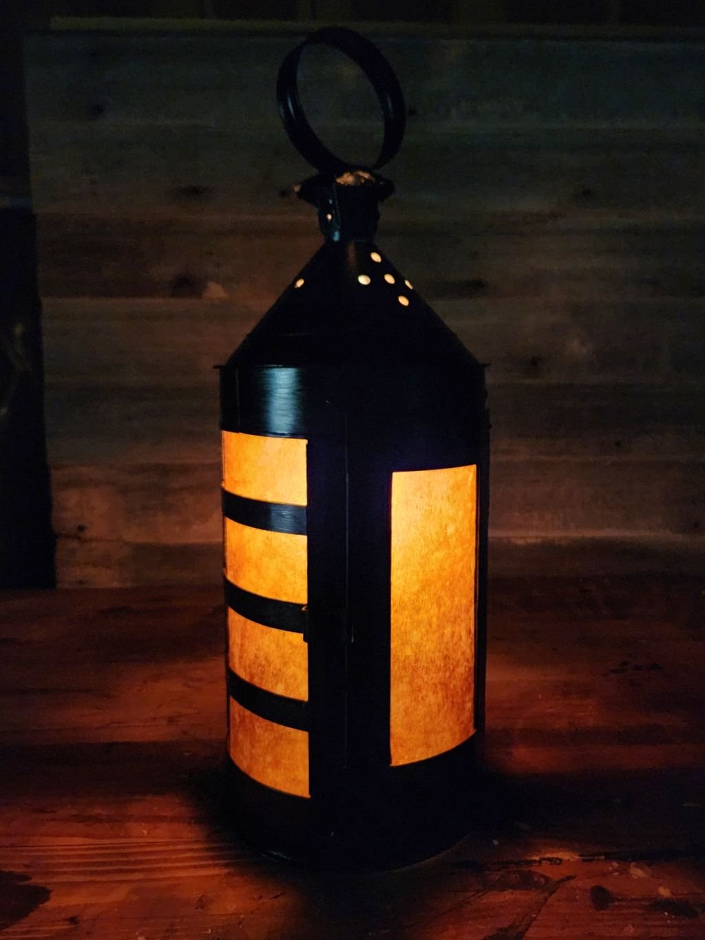Candle lit English Ship Lantern with amber panes.jpg