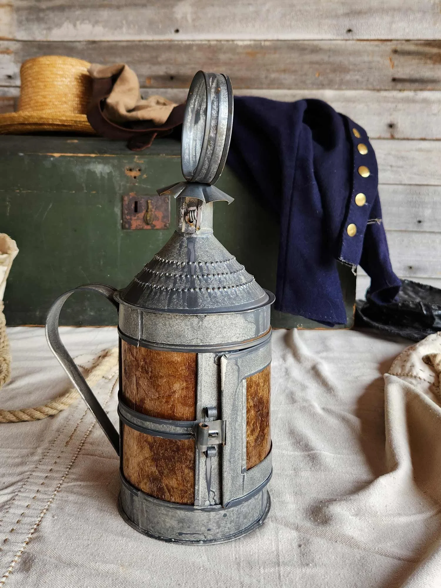 An antiqued round candle lantern inspired by a Peter Paul Rubens painting.