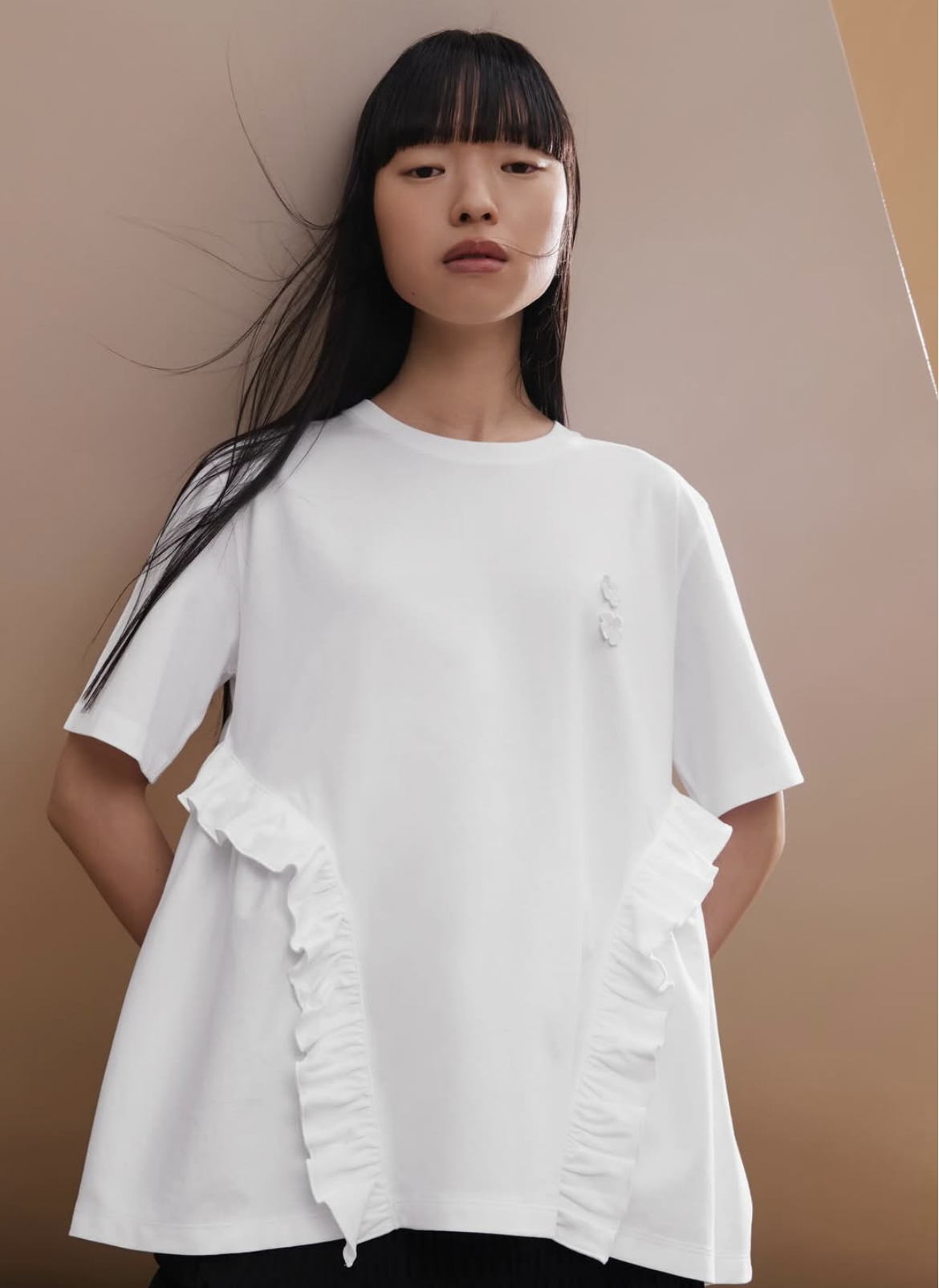 cecilie bahnsen and uniqlo collab shirt.png