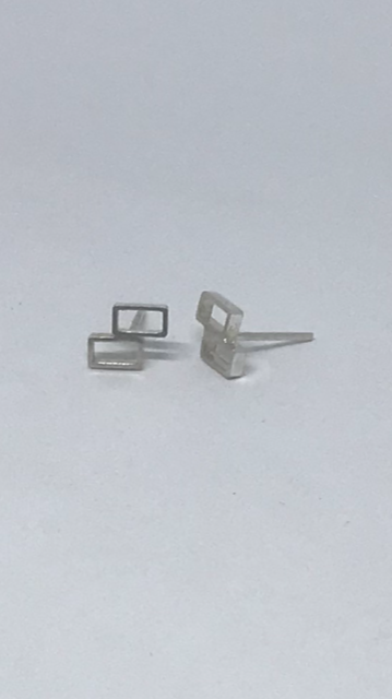 Stud earrings 2 front and side.png
