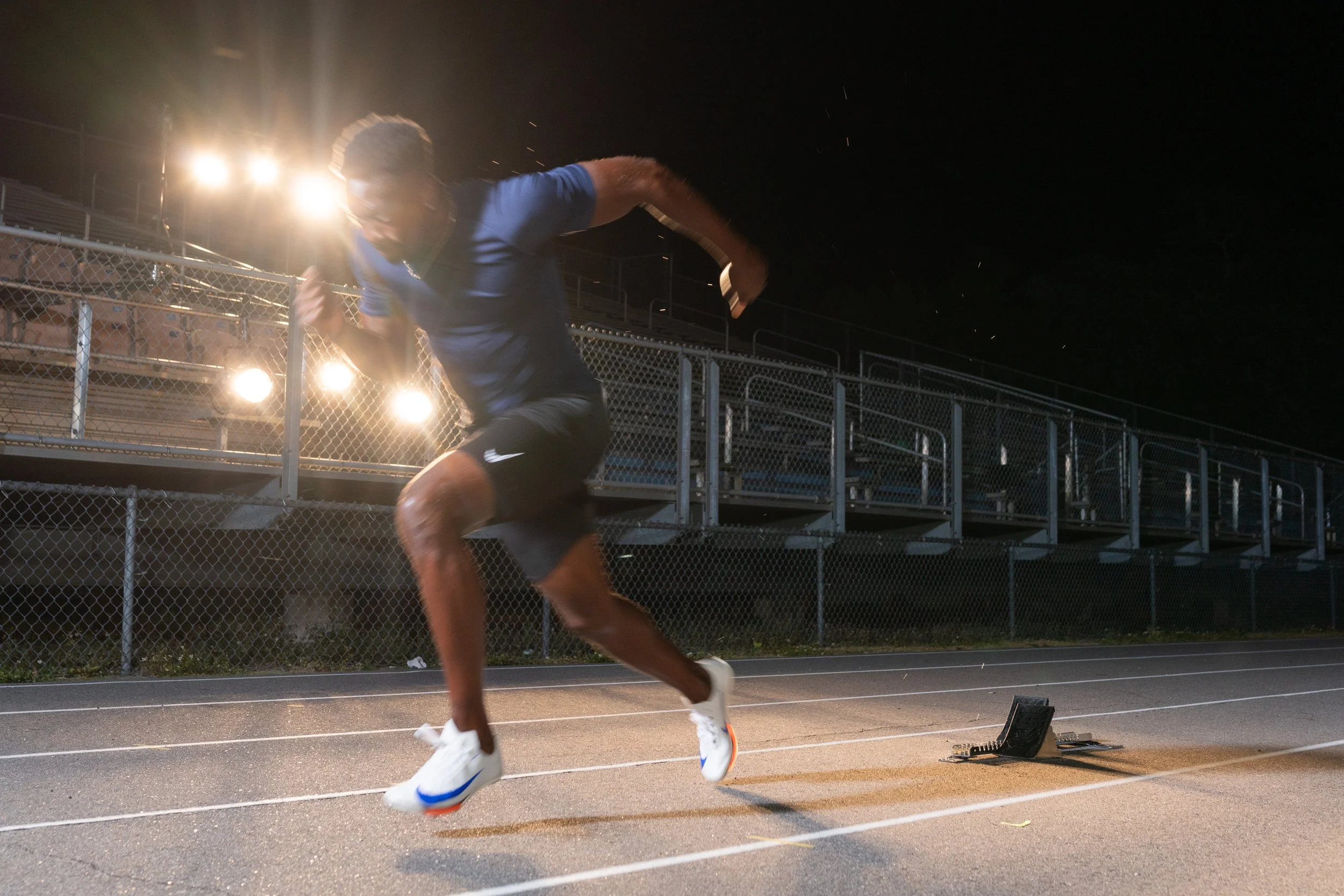 Aaron Brown blocking his movement for a new scene shot on the track and field set.
