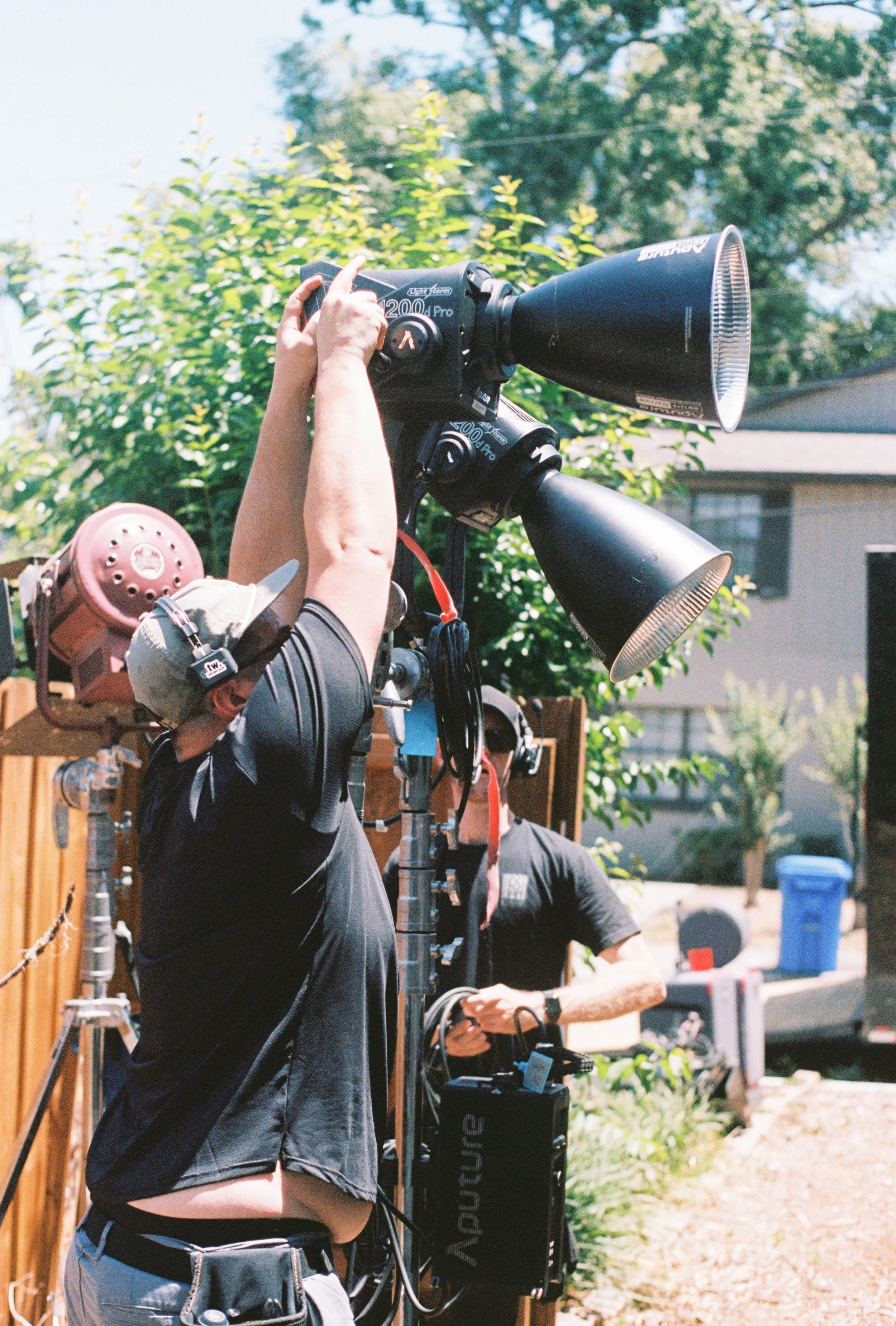 Lighting and Grip crew building out lighting schematics for the daytime scene on the Production of Look At You -- a brand anthem for Manifesto, produced by White Raven Productions.