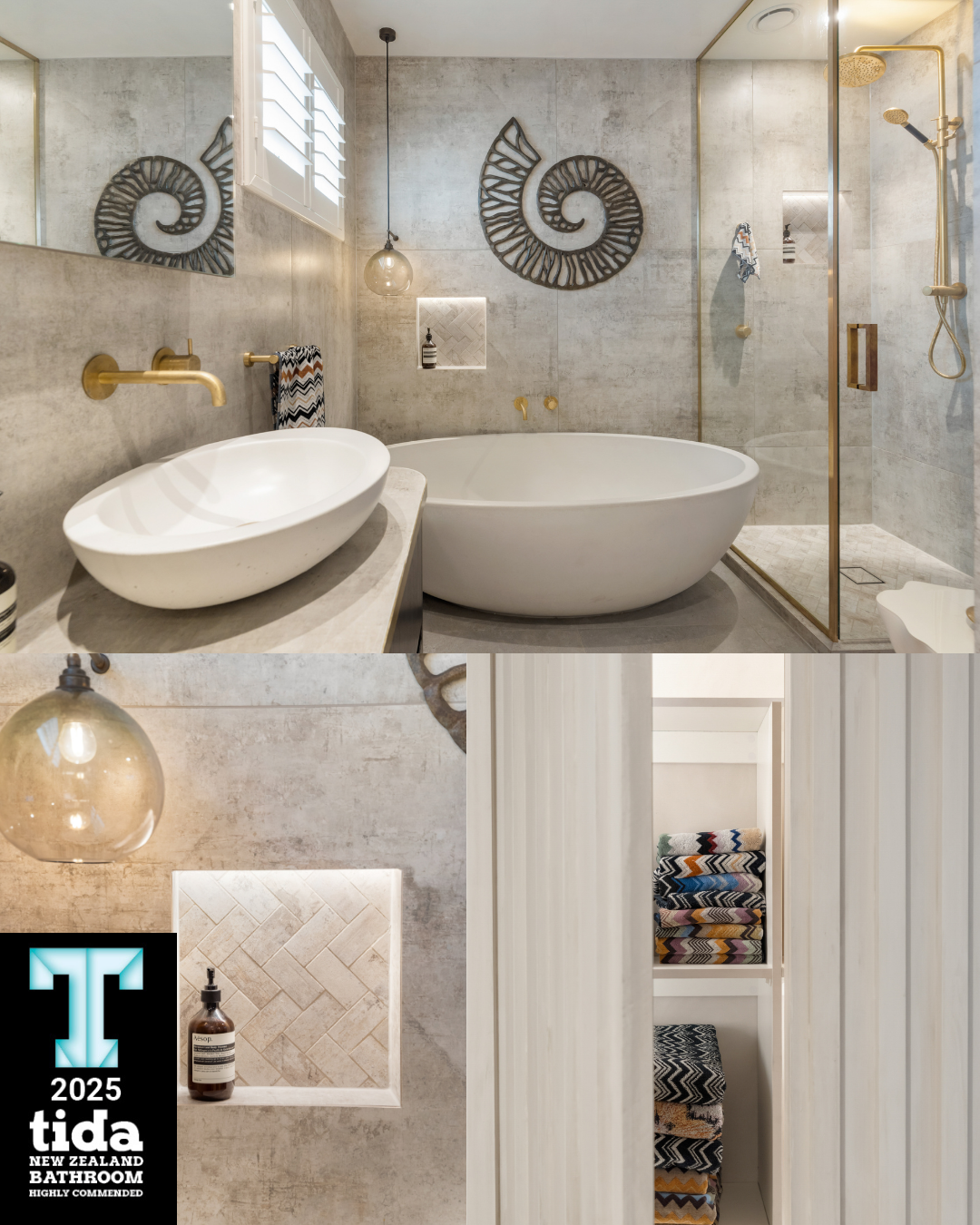 A modern bathroom featuring a freestanding bathtub, a walk-in shower with gold accents, a vessel sink with brass fixtures, and decorative wall art with spiral metal designs. A niche in the wall contains bottles and a small shelf with decorative objects, with a window covered by white shutters. The lower part shows a close-up of a light fixture and a built-in shelf with towels.