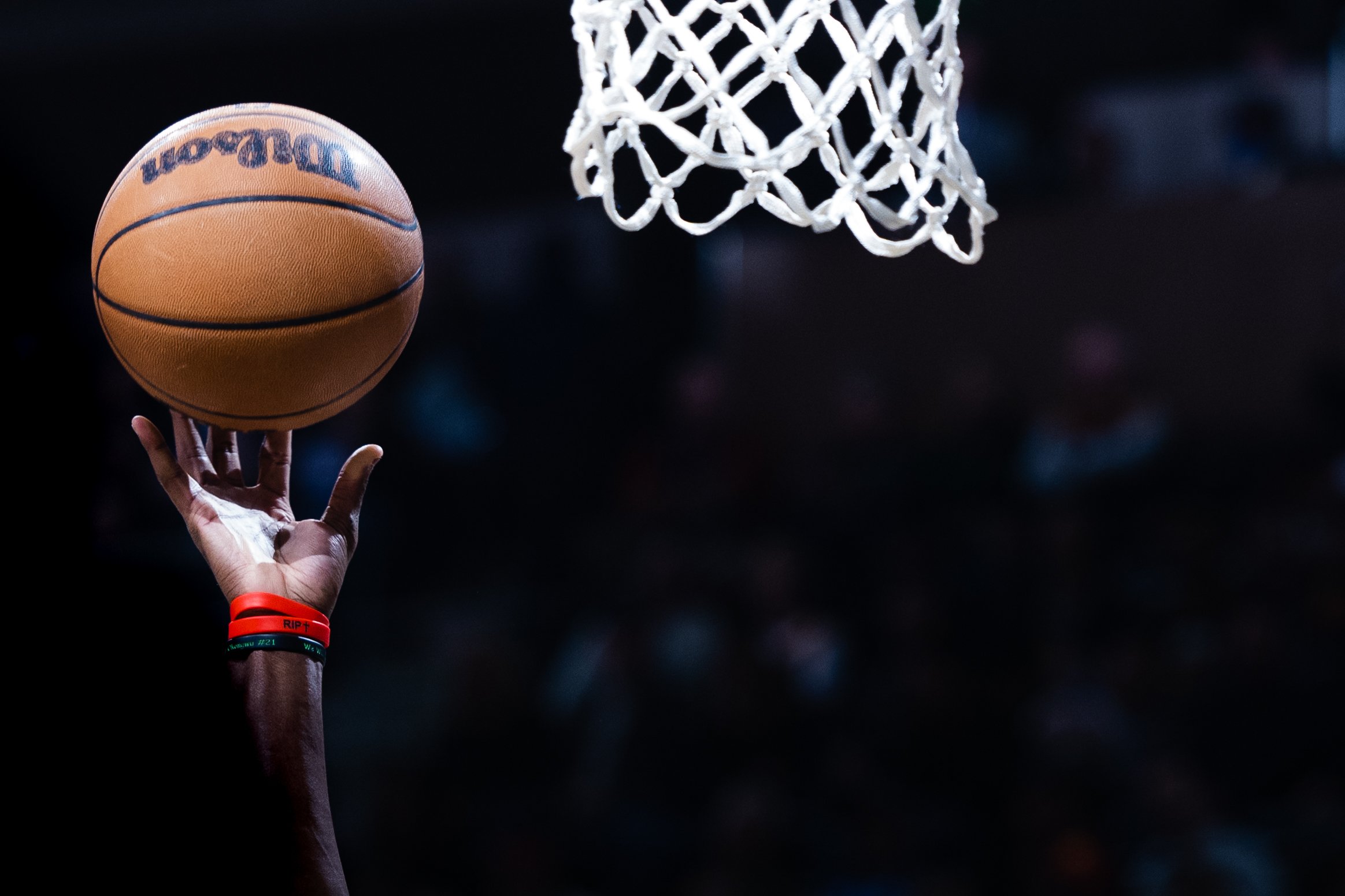  A flash illuminates the ball during an NBA game at Vivint Arena on January 3, 2022. 