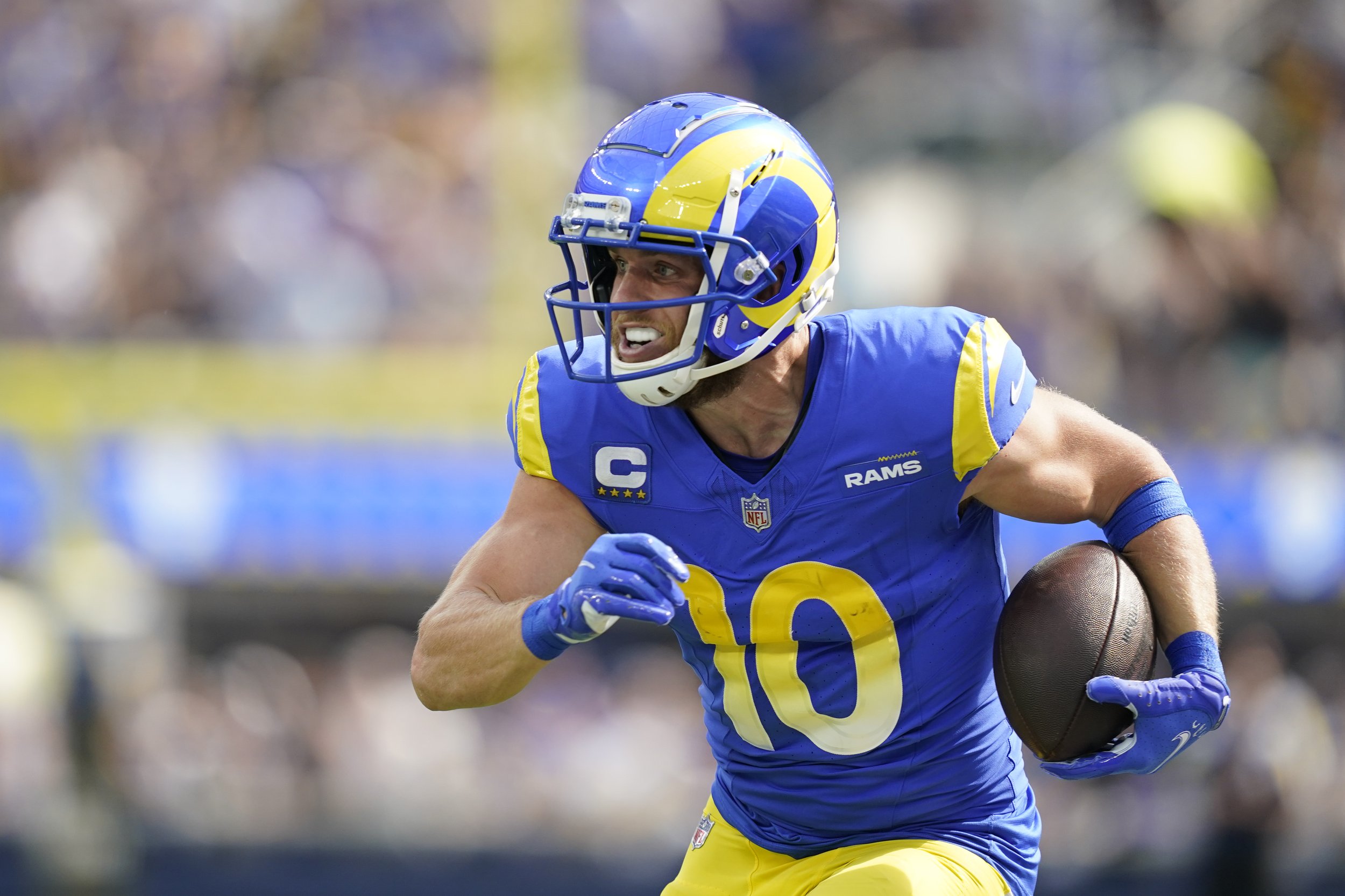  Los Angeles Rams wide receiver Cooper Kupp (10) runs after a catch during the first half of an NFL football game Sunday, Oct. 15, 2023, in Inglewood, Calif. 