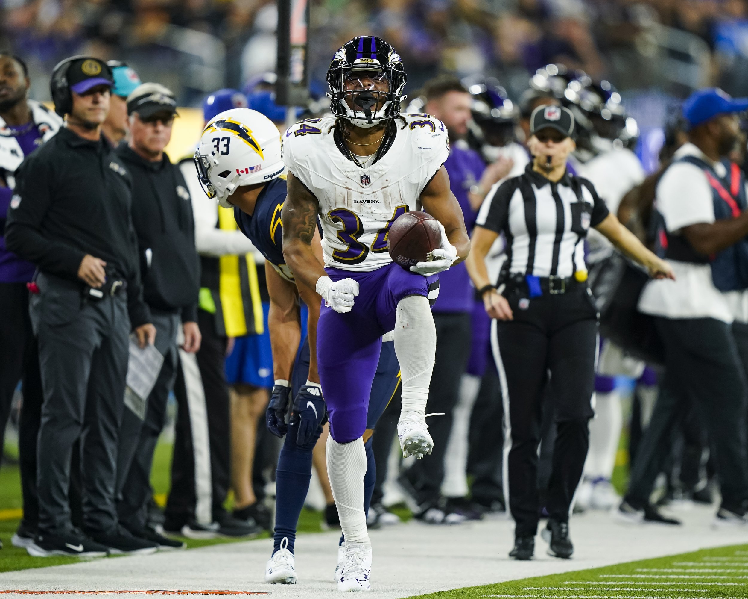  Baltimore Ravens running back Keaton Mitchell (34) reacts after running for a first down during the second half of an NFL football game against the Los Angeles Chargers, Sunday, Nov. 26, 2023, in Inglewood, Calif. 