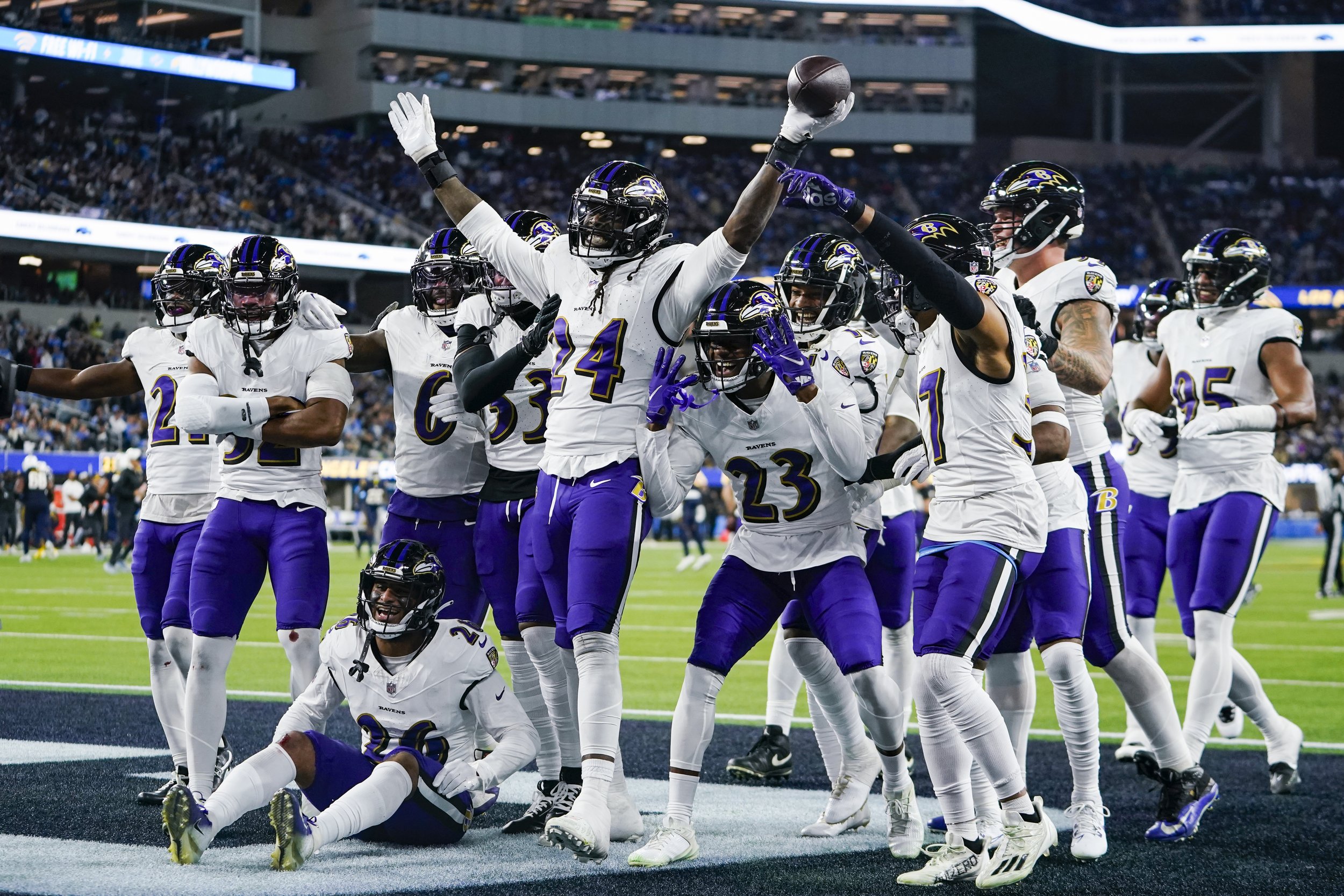  Baltimore Ravens linebacker Jadeveon Clowney (24) celebrates with teammates after recovering a fumble by Los Angeles Chargers quarterback Justin Herbert during the second half of an NFL football game Sunday, Nov. 26, 2023, in Inglewood, Calif. 