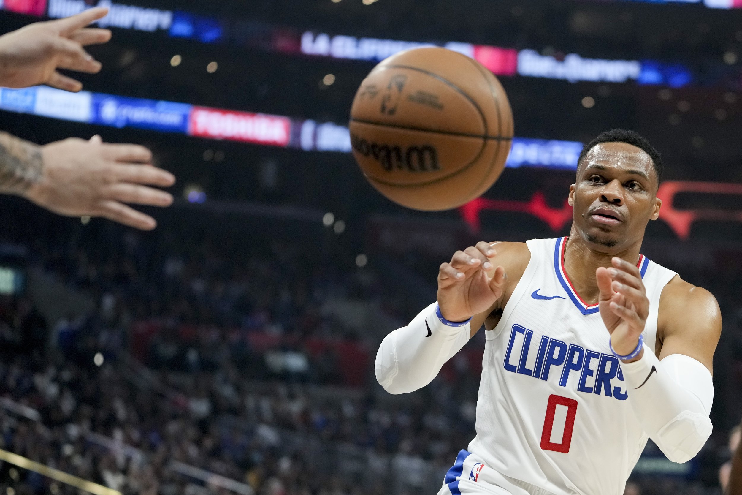  Los Angeles Clippers guard Russell Westbrook catches an inbound pass during the first half of an NBA basketball game against the Sacramento Kings, Sunday, Feb. 25, 2024, in Los Angeles. 