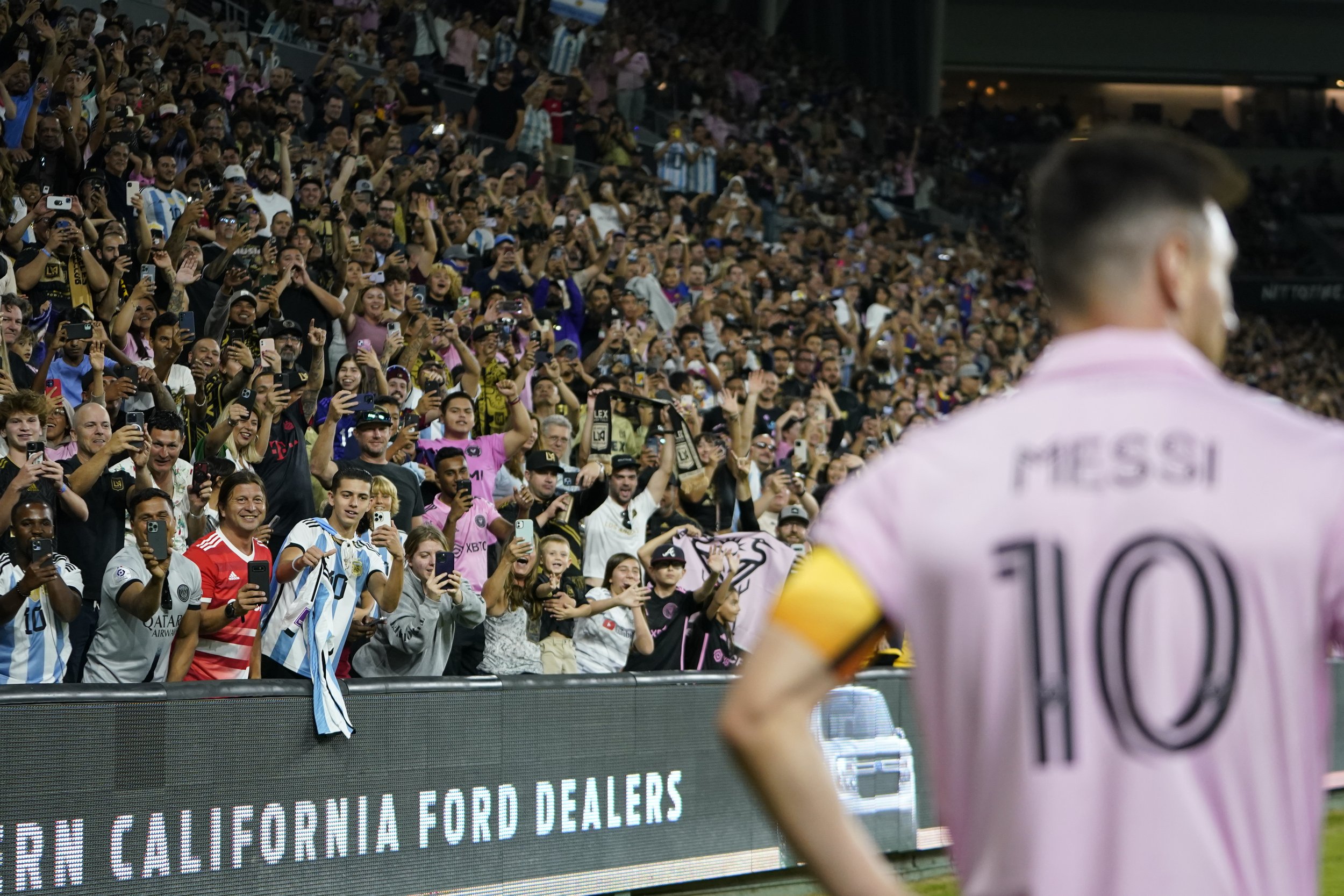  Fans cheer as Inter Miami forward Lionel Messi (10) waits for a corner kick during the second half of an MLS soccer match against Los Angeles FC, Sunday, Sept. 3, 2023, in Los Angeles. 