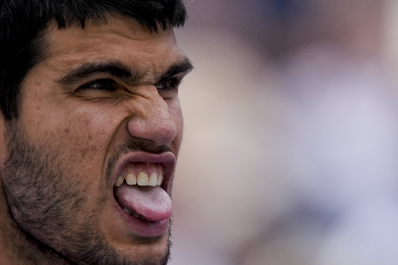  Carlos Alcaraz, of Spain, reacts after winning a point against Daniil Medvedev, of Russia, during the final match at the BNP Paribas Open tennis tournament, Sunday, March 17, 2024, in Indian Wells, Calif. (AP Photo/Ryan Sun) 