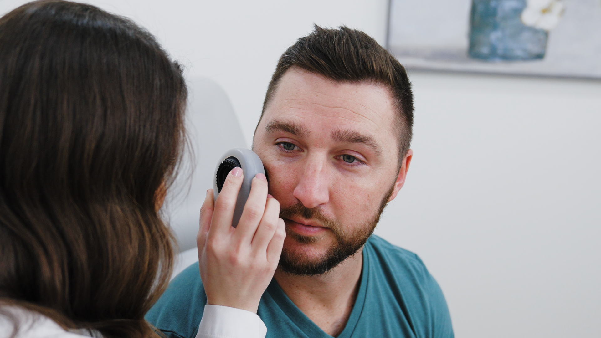 Dr Fontenot Checking skin for moles
