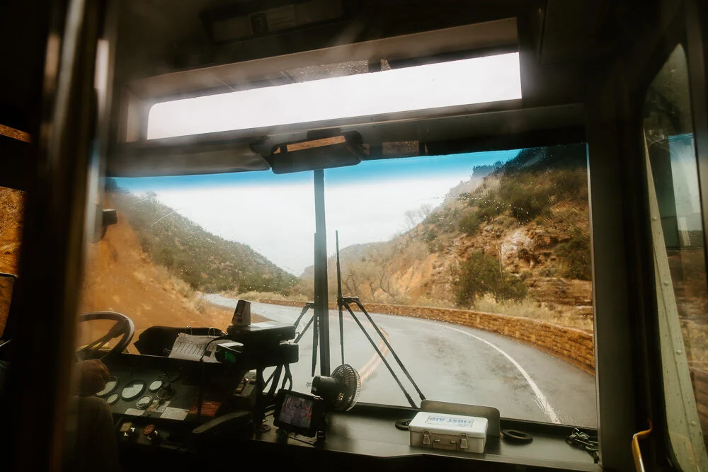 Mountain road lined with rocky hillsides