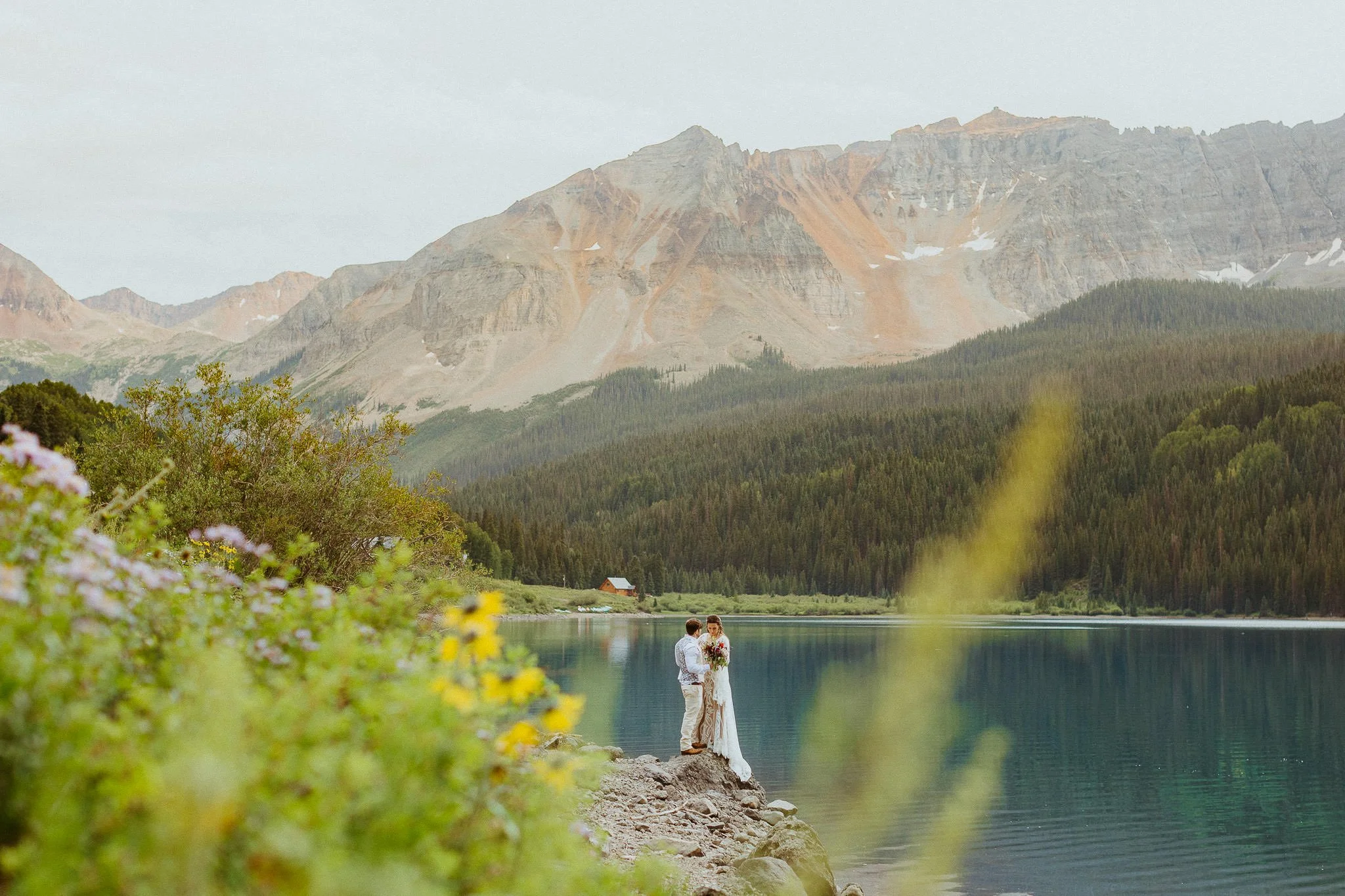 A couple elopes at Trout Lake, a drive up elopement location in Colorado.