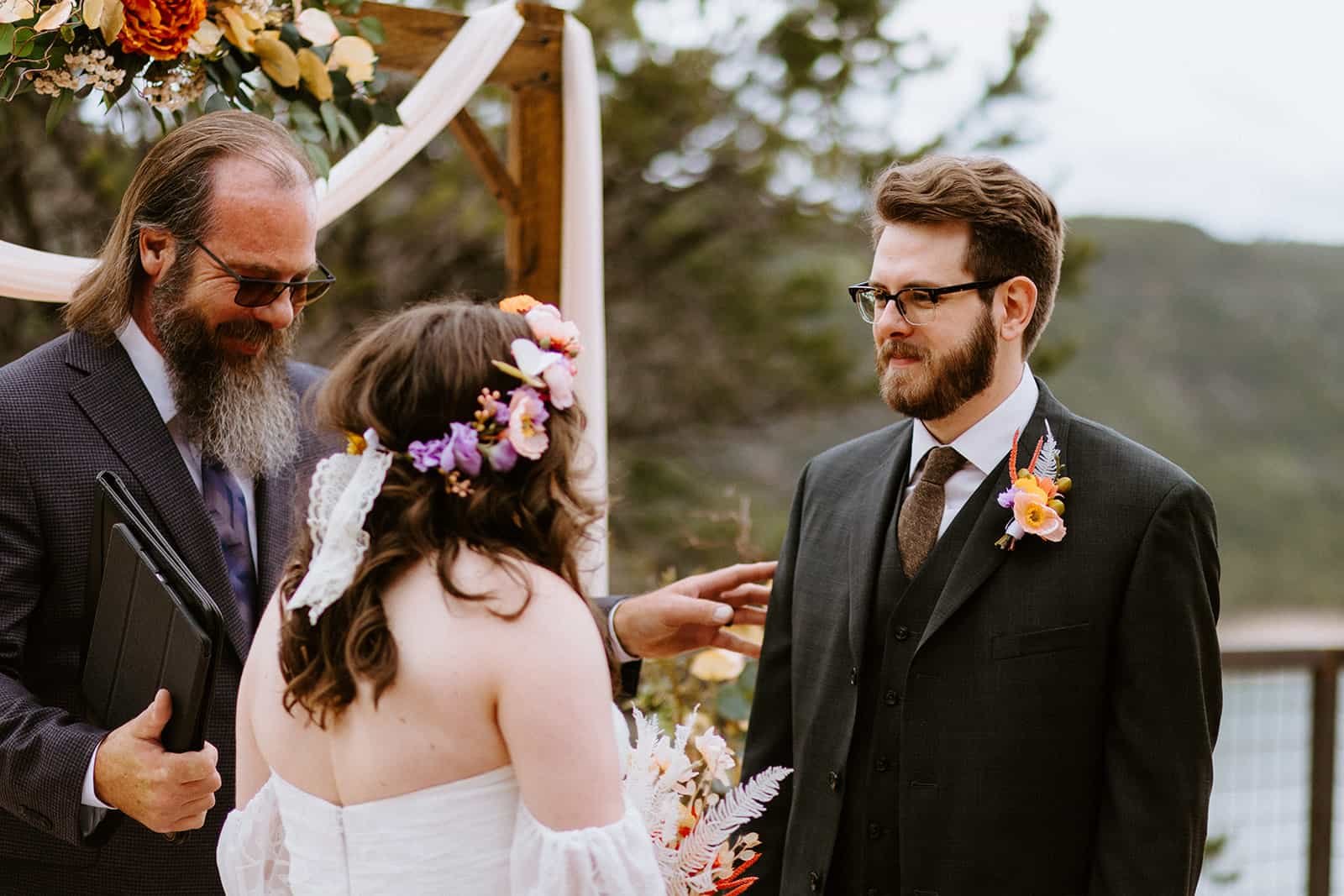 A man and woman saying vows at their elopement
