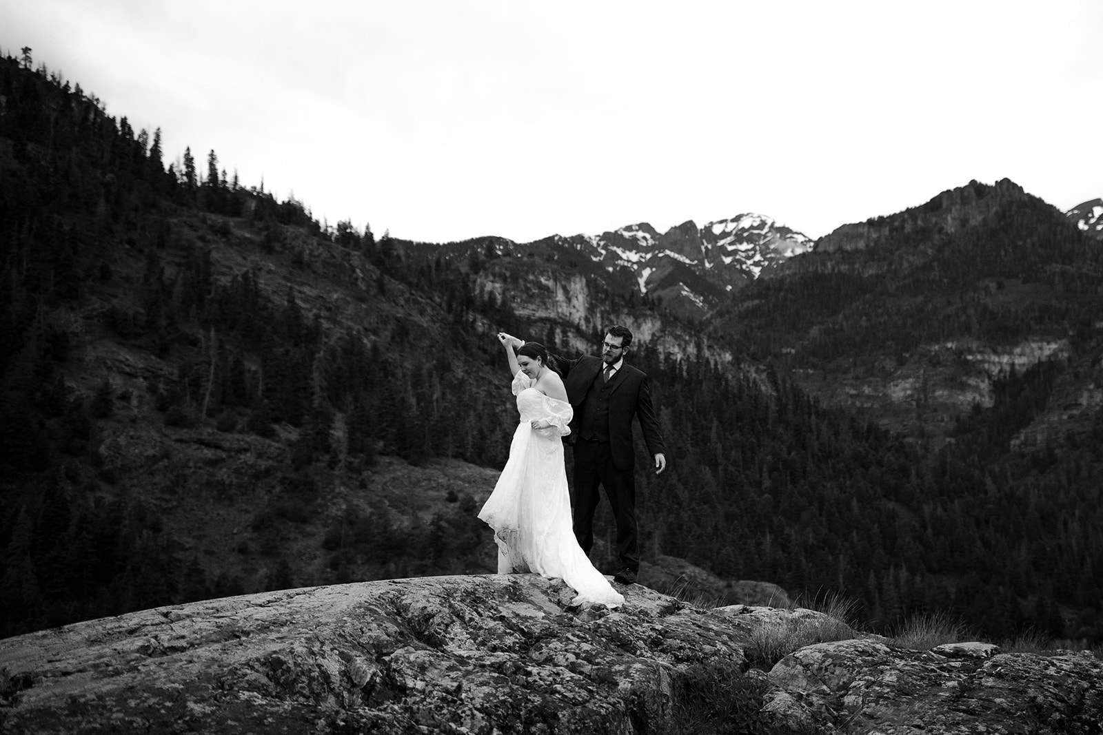a couple dances on their elopement day in Ouray