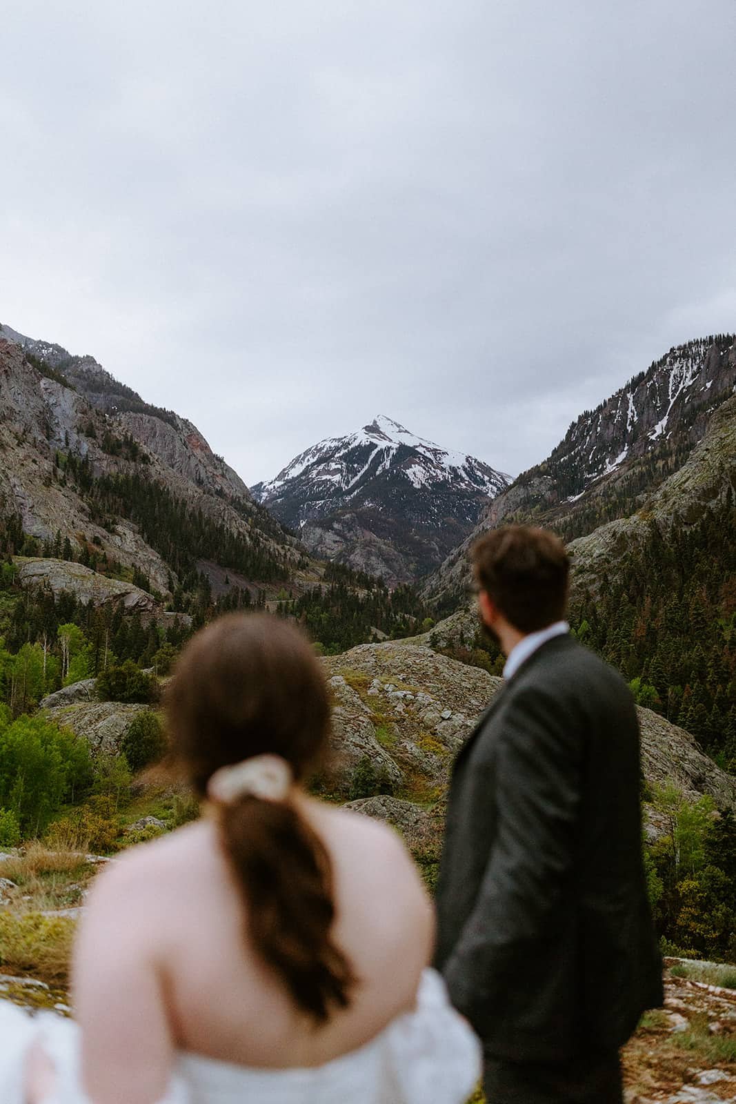 A man and woman explore an overlook off the Million Dollar Highway outside of Ridgway
