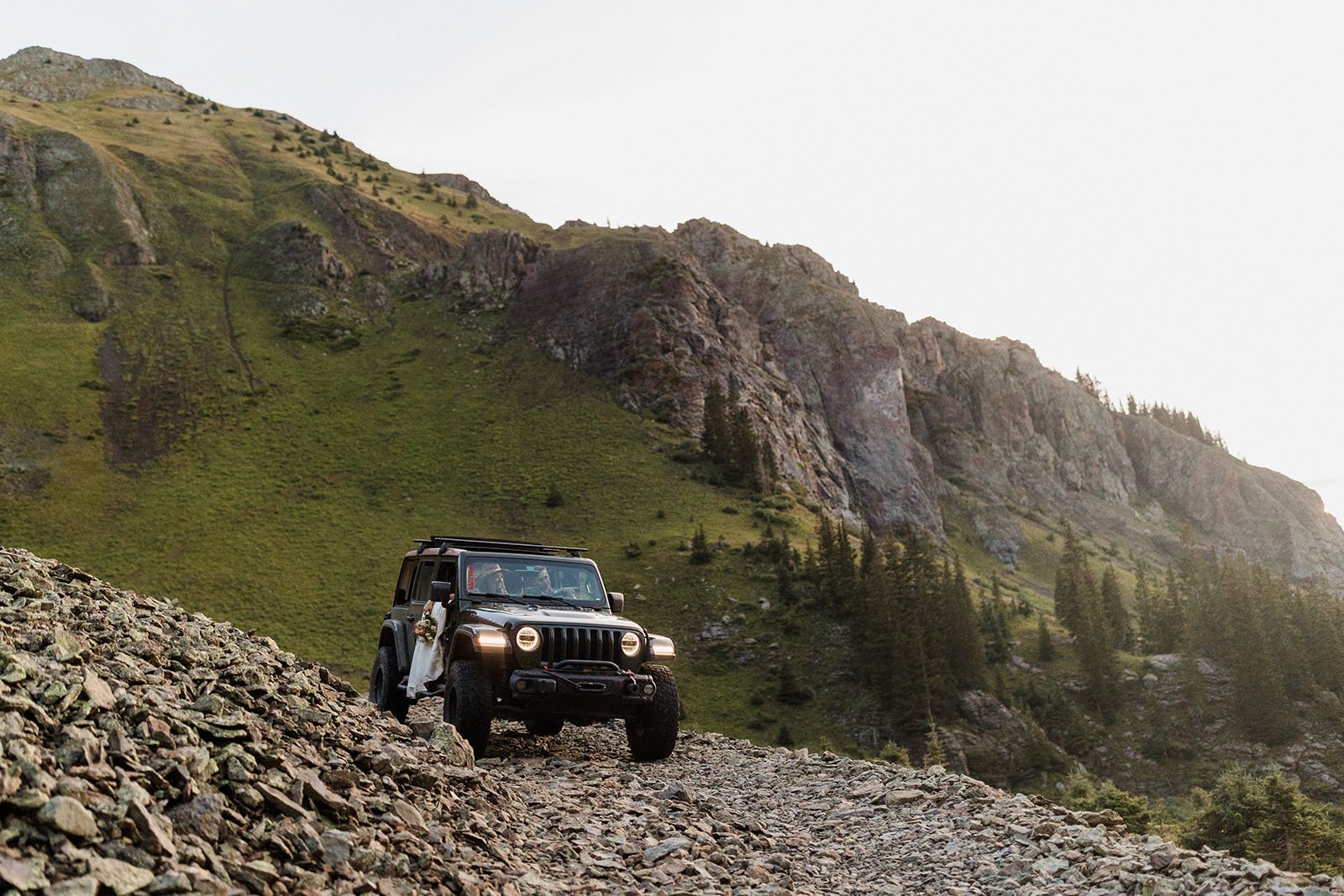 couple in Jeep on 4x4 road San Juan Mountains elopement