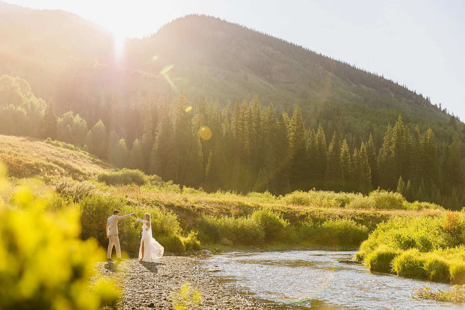 Intimate wedding with family in Crested Butte, Colorado surrounded by lush mountain meadows