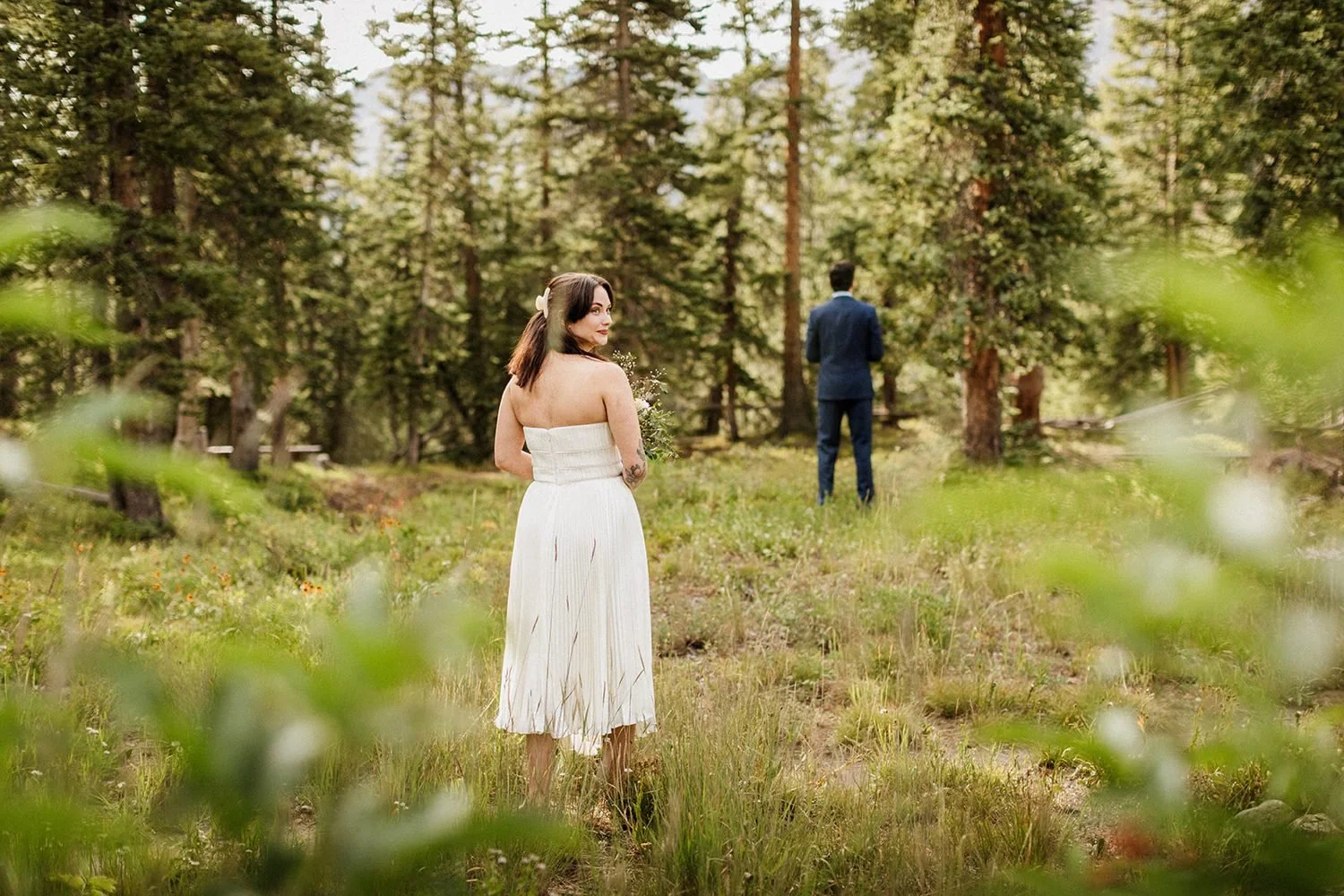lake-irwin-elopement-crested-butte-03-first-look-walking-up.jpg