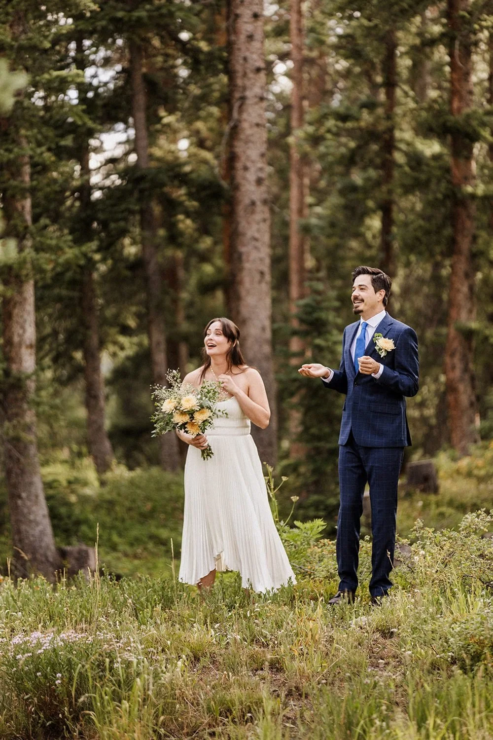 lake-irwin-elopement-crested-butte-08-meadow-laughing.jpg