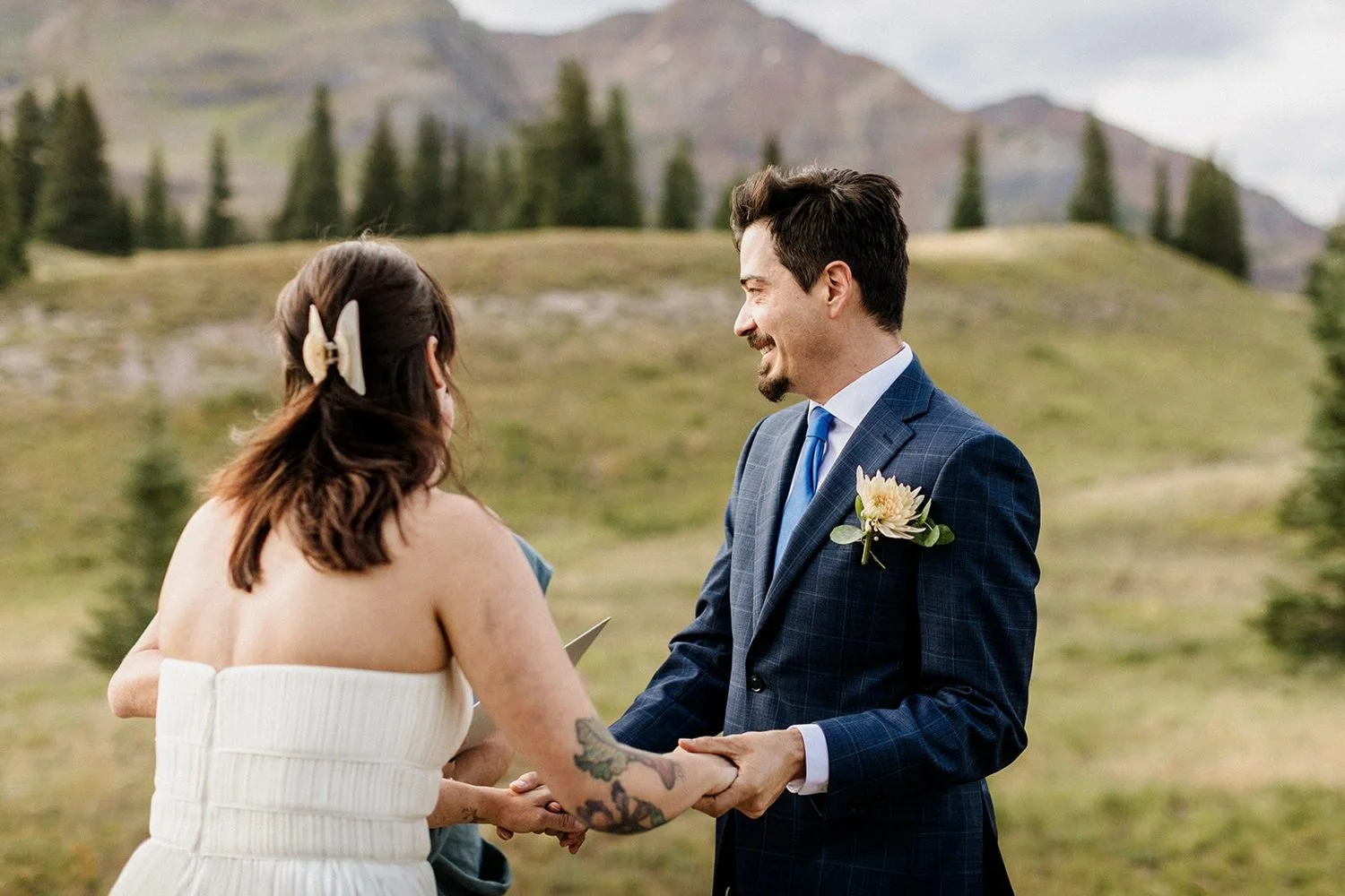 lake-irwin-elopement-crested-butte-50-holding-hands-ceremony.jpg